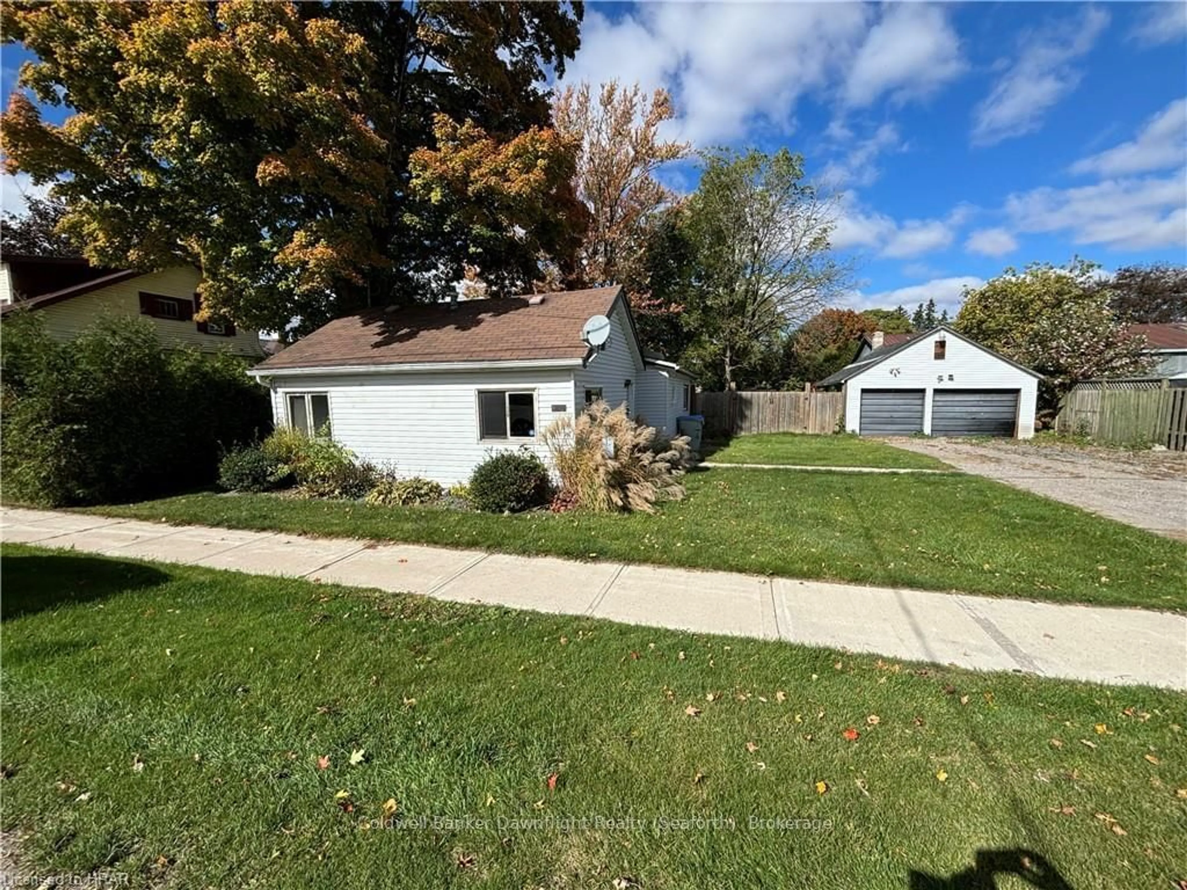 Frontside or backside of a home, the fenced backyard for 130 RICHMOND St, South Huron Ontario N0G 1K0