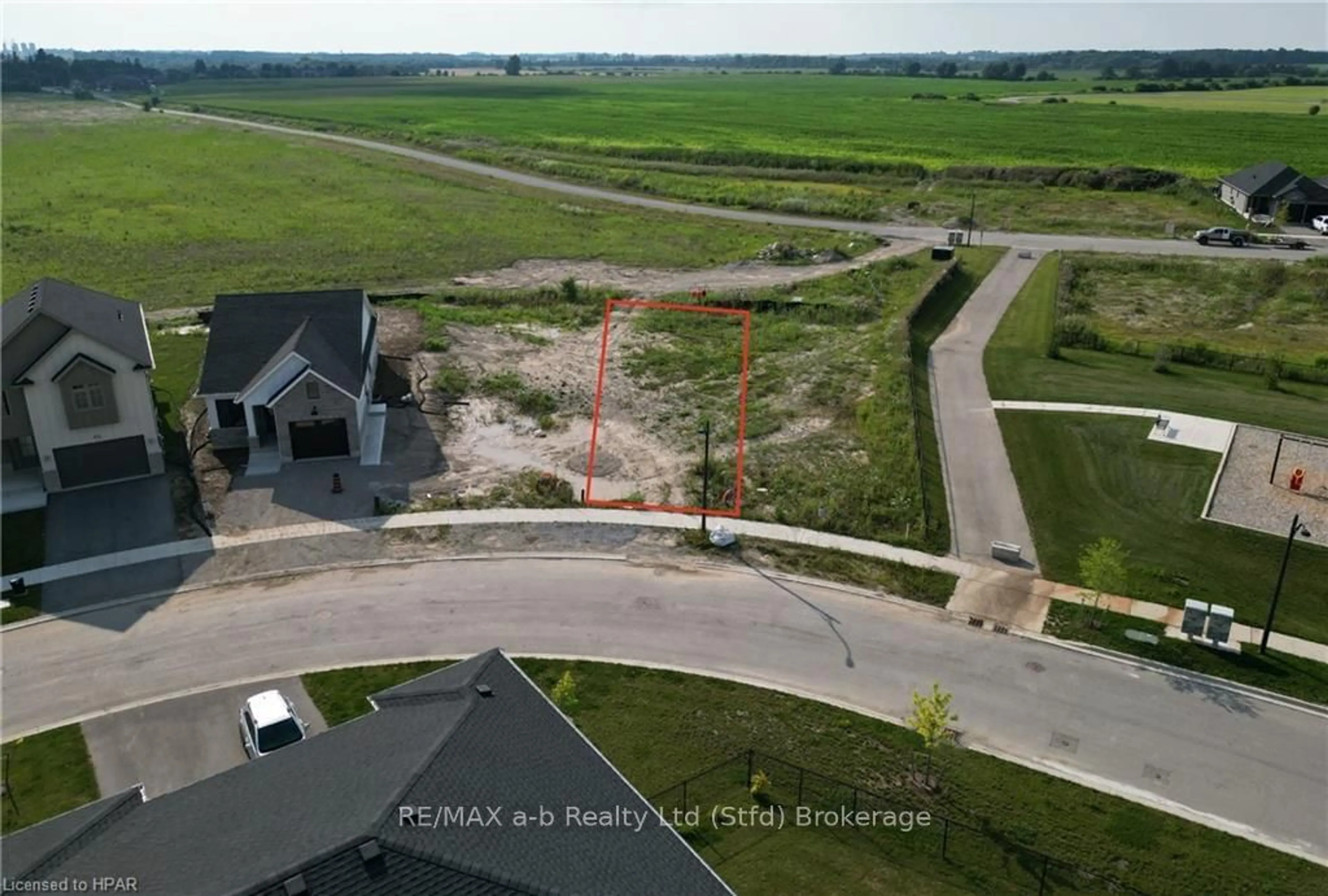 Frontside or backside of a home, the fenced backyard for 58 TRAIL SIDE DRIVE, St. Marys Ontario N4X 0C1