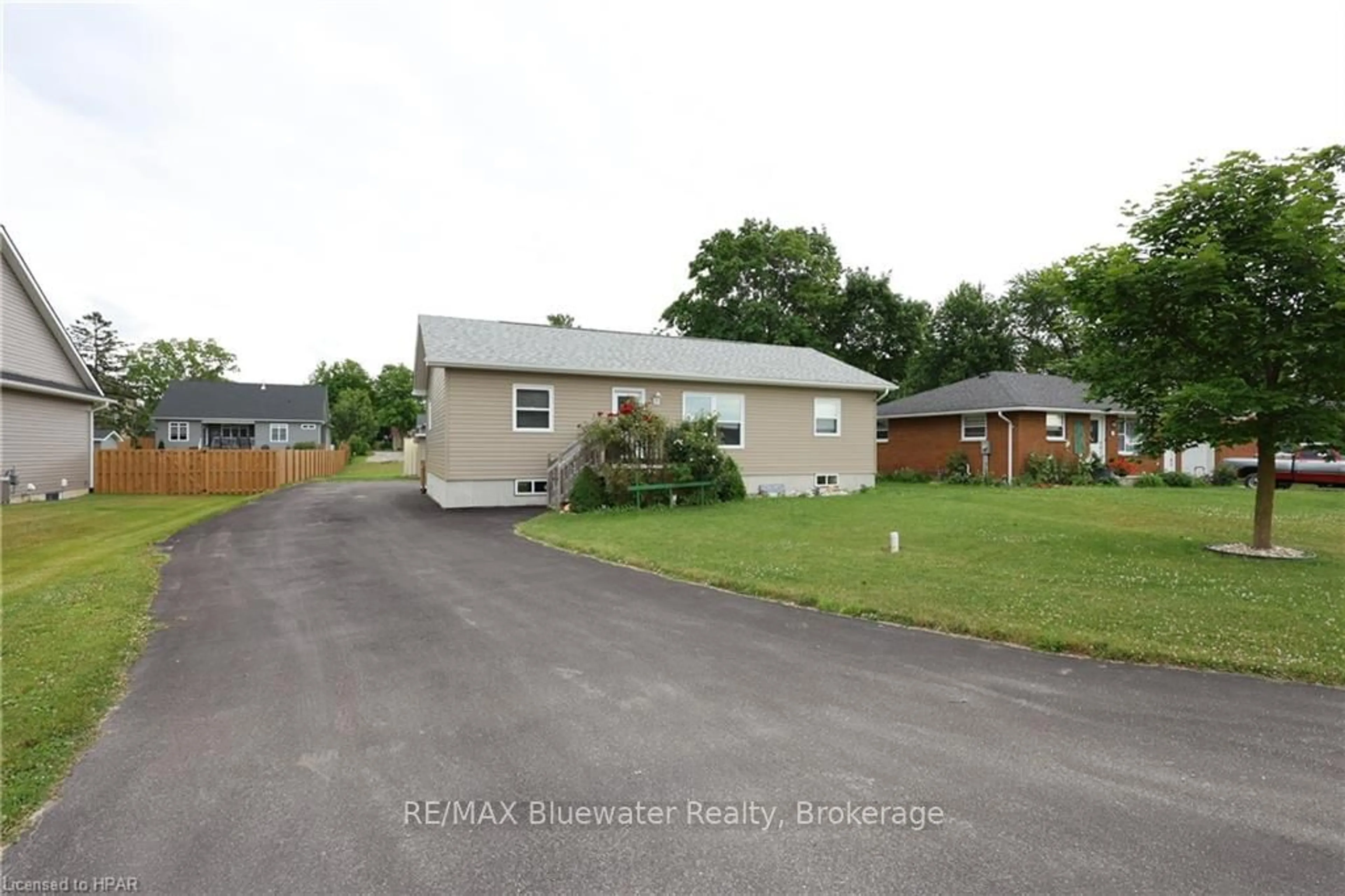 Frontside or backside of a home, the fenced backyard for 17 JOHN St, Bluewater Ontario N0M 2T0