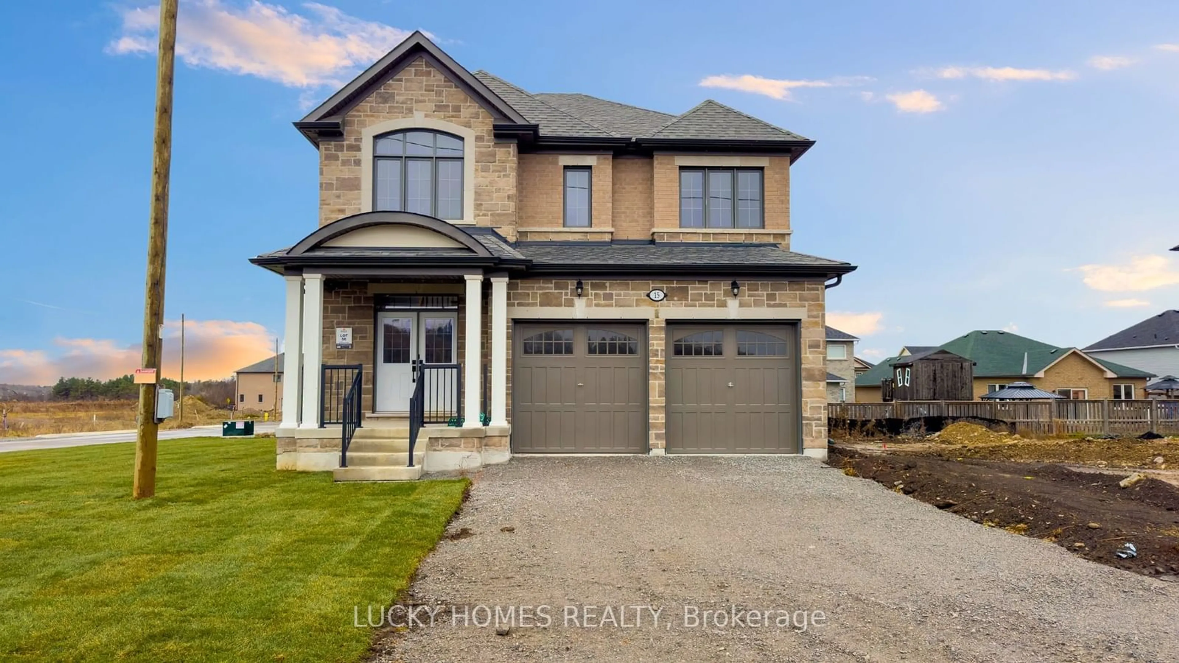 Frontside or backside of a home, the street view for 15 Fisher Rd, Kawartha Lakes Ontario K9V 0E5