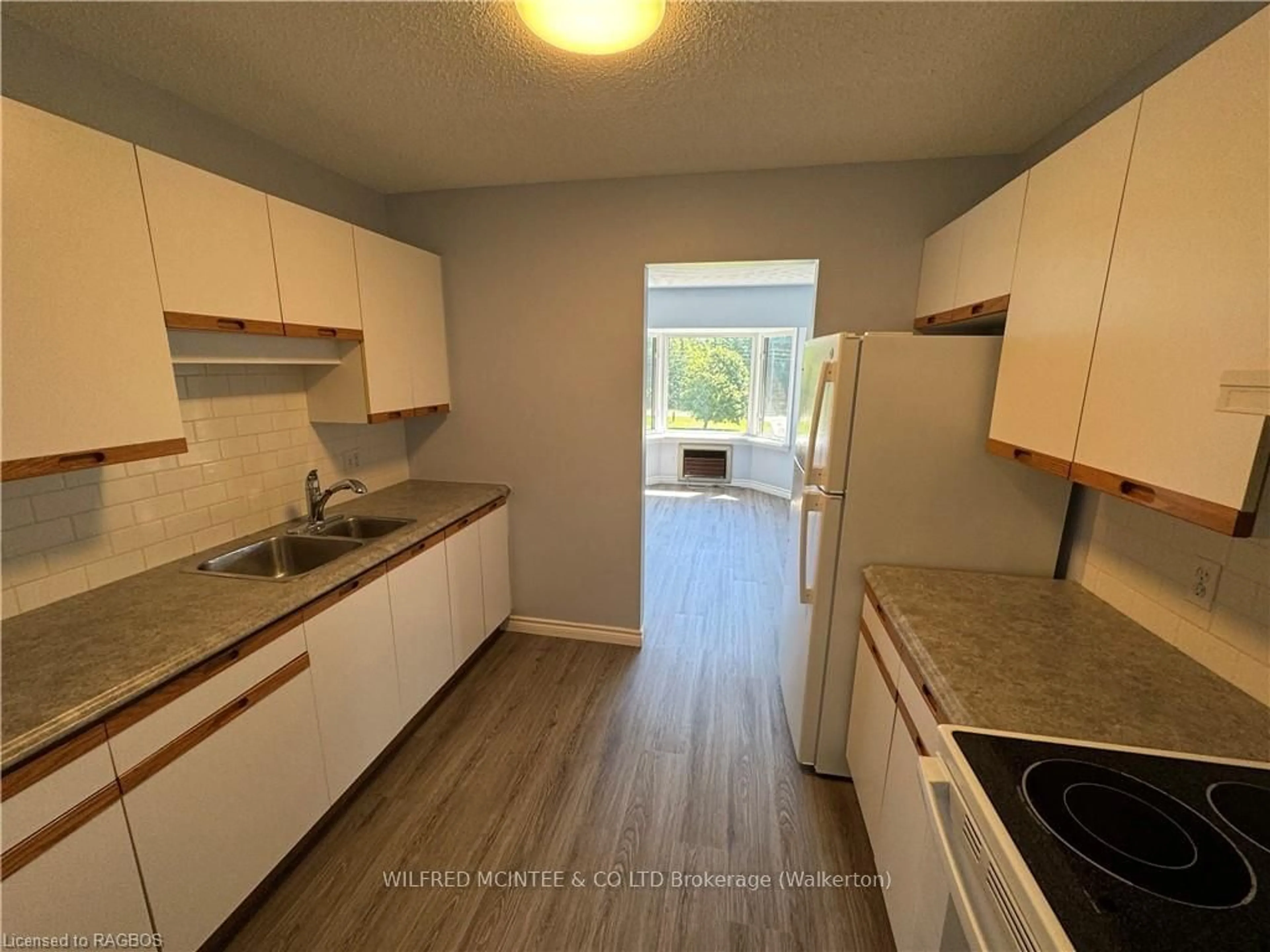 Standard kitchen, wood floors for 125 HINKS St #303, Brockton Ontario N0G 2V0