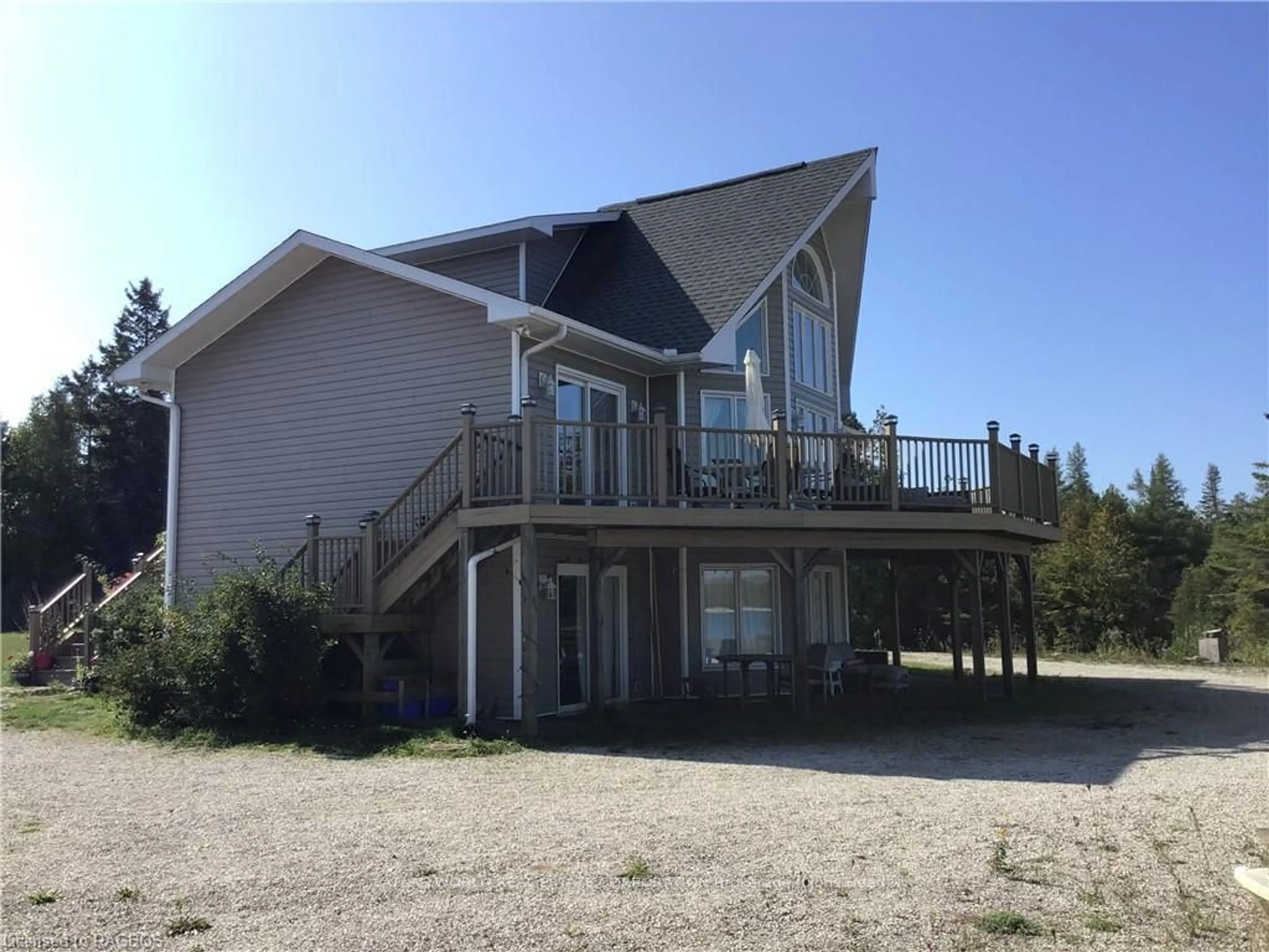 Frontside or backside of a home, the front or back of building for 56 SILVERSIDES POINT Dr, Northern Bruce Peninsula Ontario N0H 1Z0