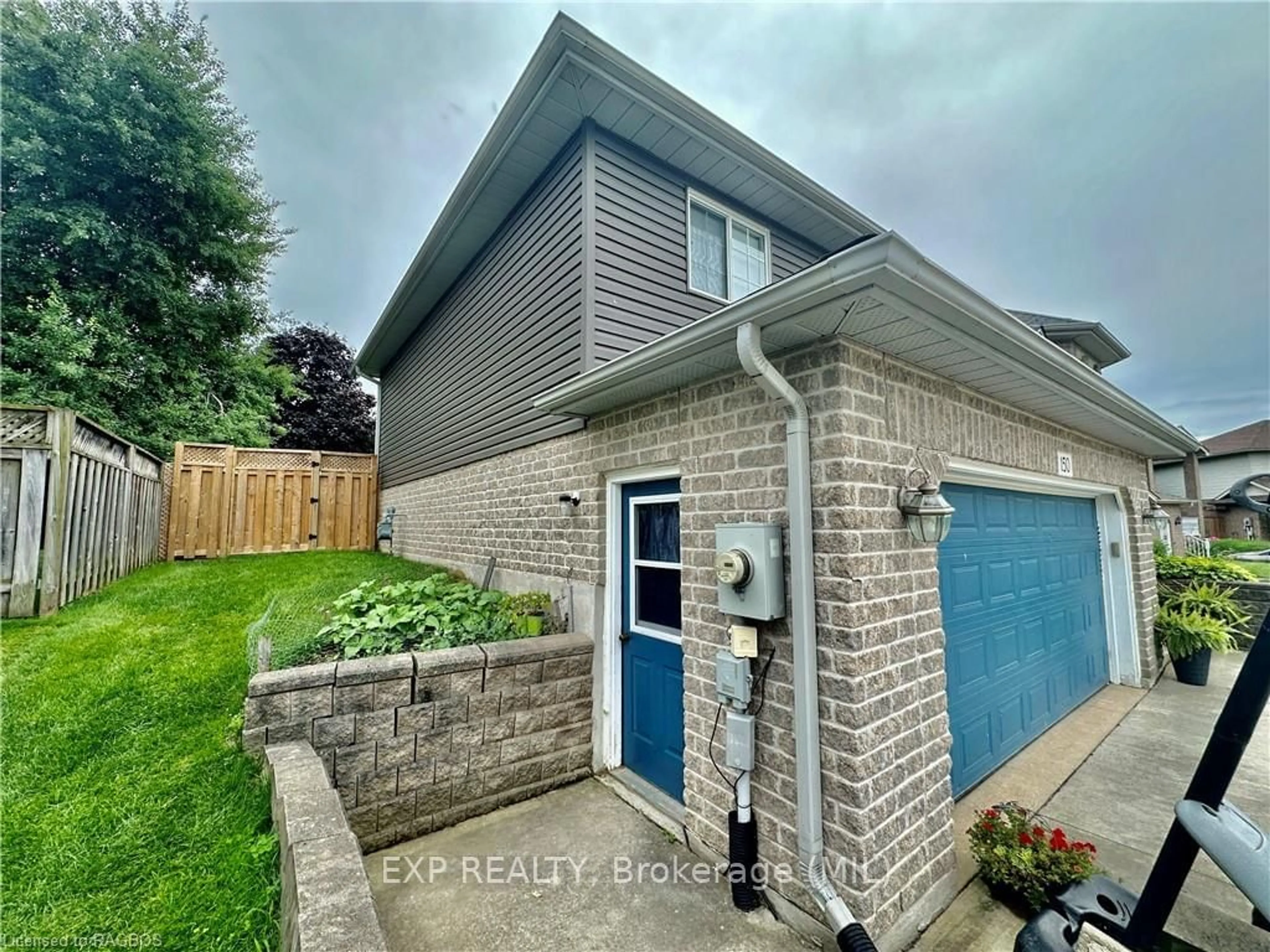 Frontside or backside of a home, the fenced backyard for 150 16TH, Hanover Ontario N4N 3V3