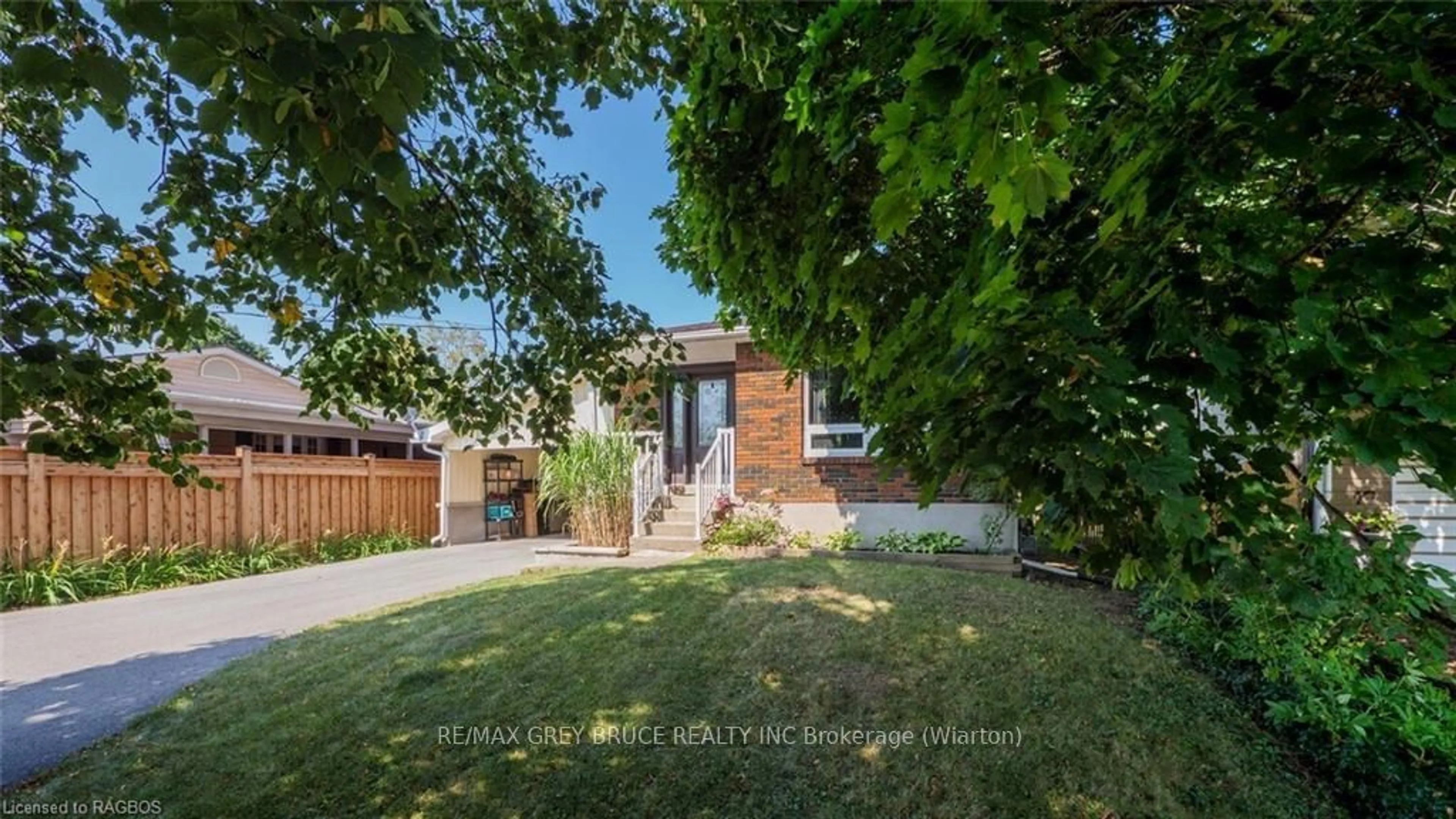 Frontside or backside of a home, the fenced backyard for 2086 8TH AVE E, Owen Sound Ontario N4K 3C6