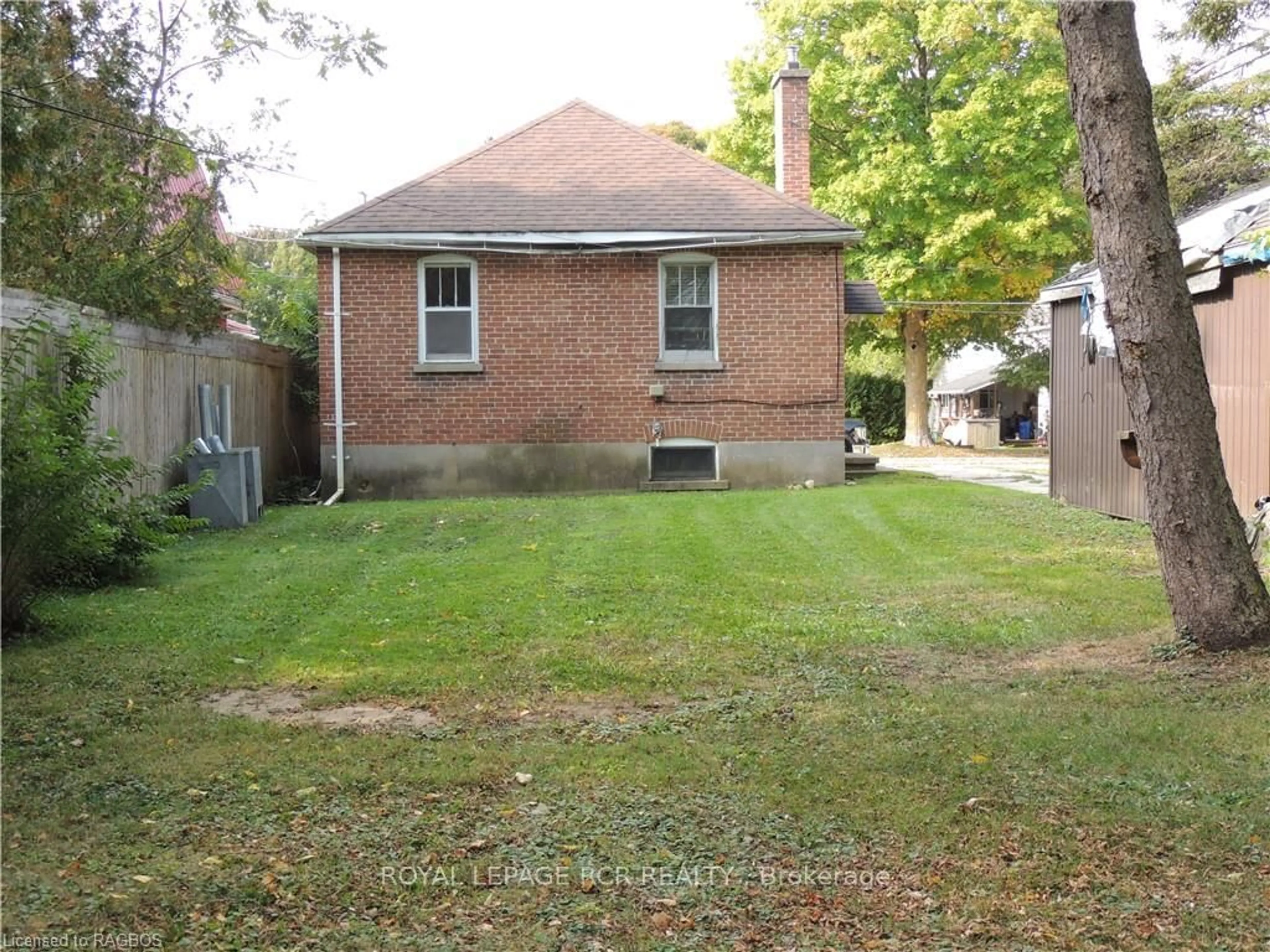 Frontside or backside of a home, the fenced backyard for 151 COUNTESS St, West Grey Ontario N0G 1R0