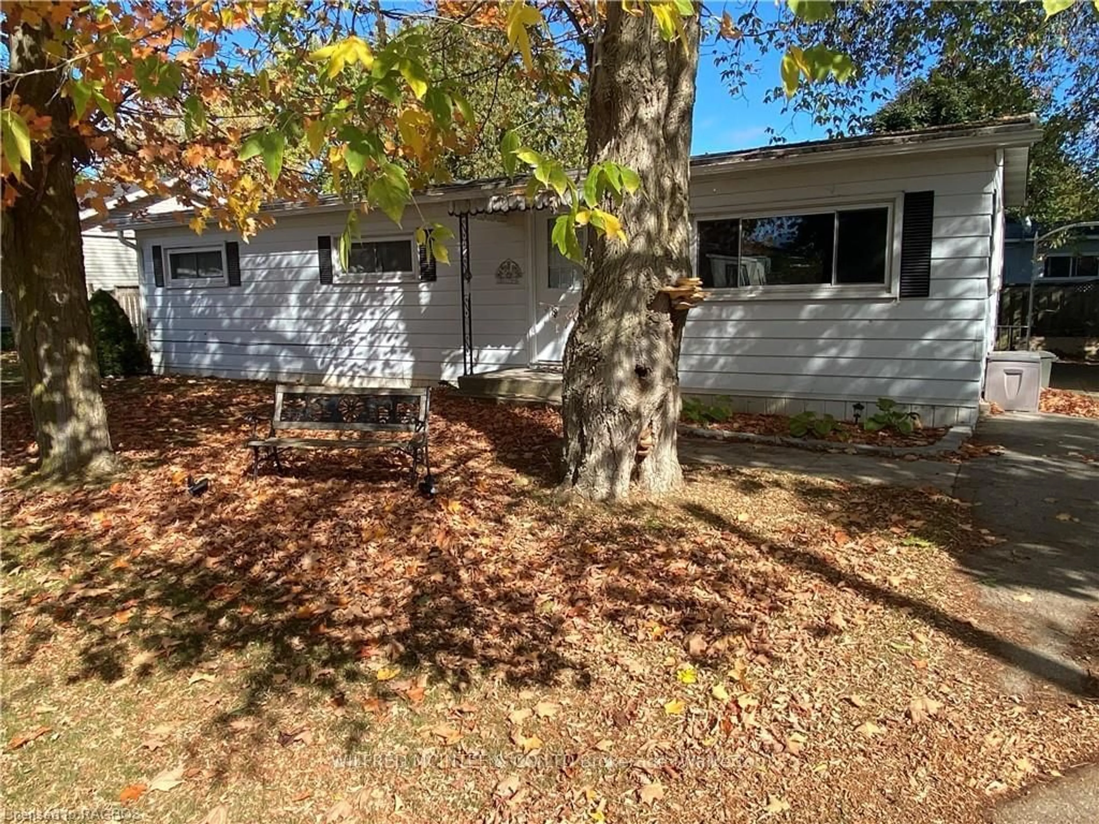 Frontside or backside of a home, the fenced backyard for 20 CARDINAL St, Brockton Ontario N0G 2V0