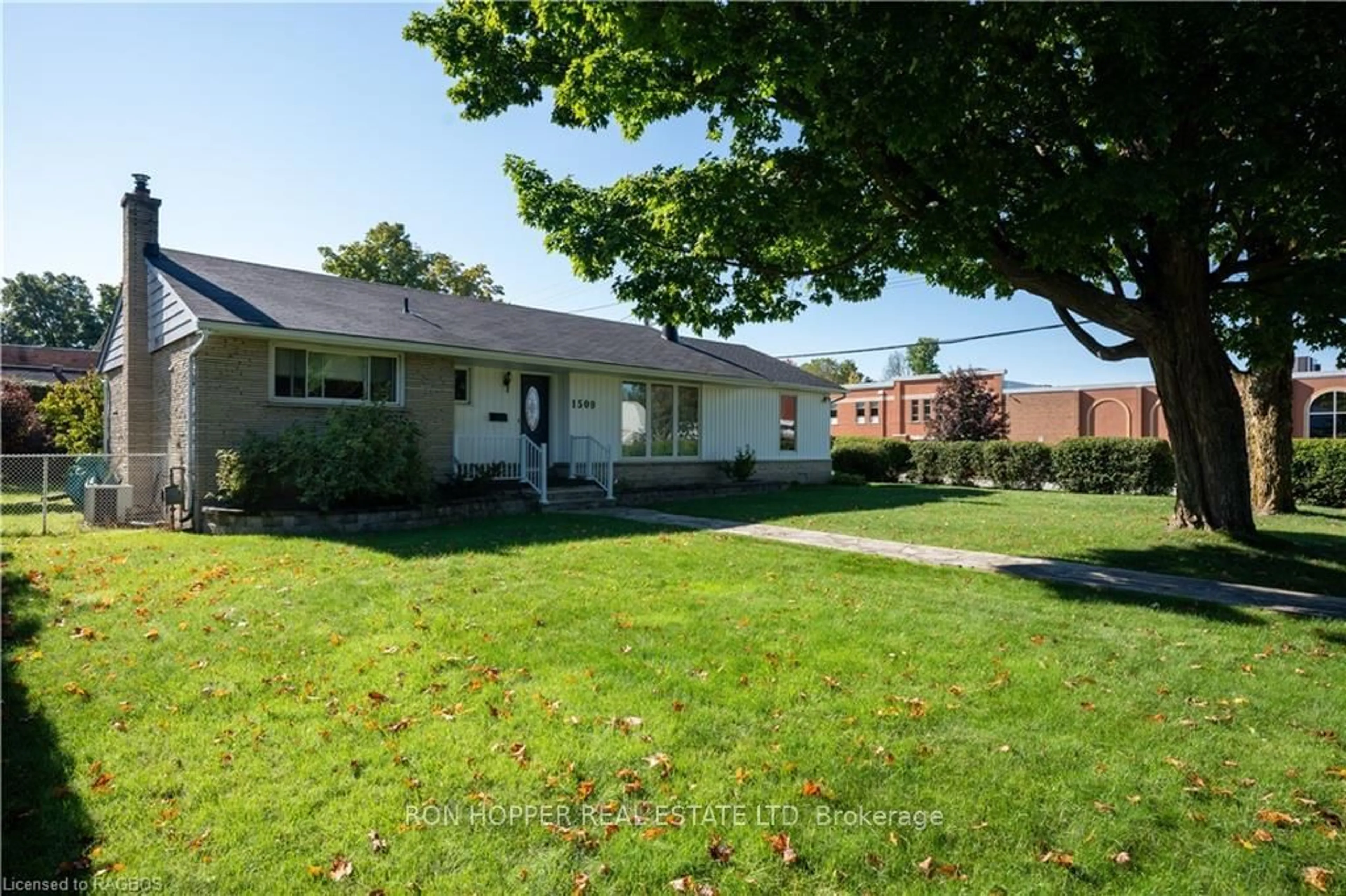 Frontside or backside of a home, the fenced backyard for 1509 6TH Ave, Owen Sound Ontario N4K 2V5