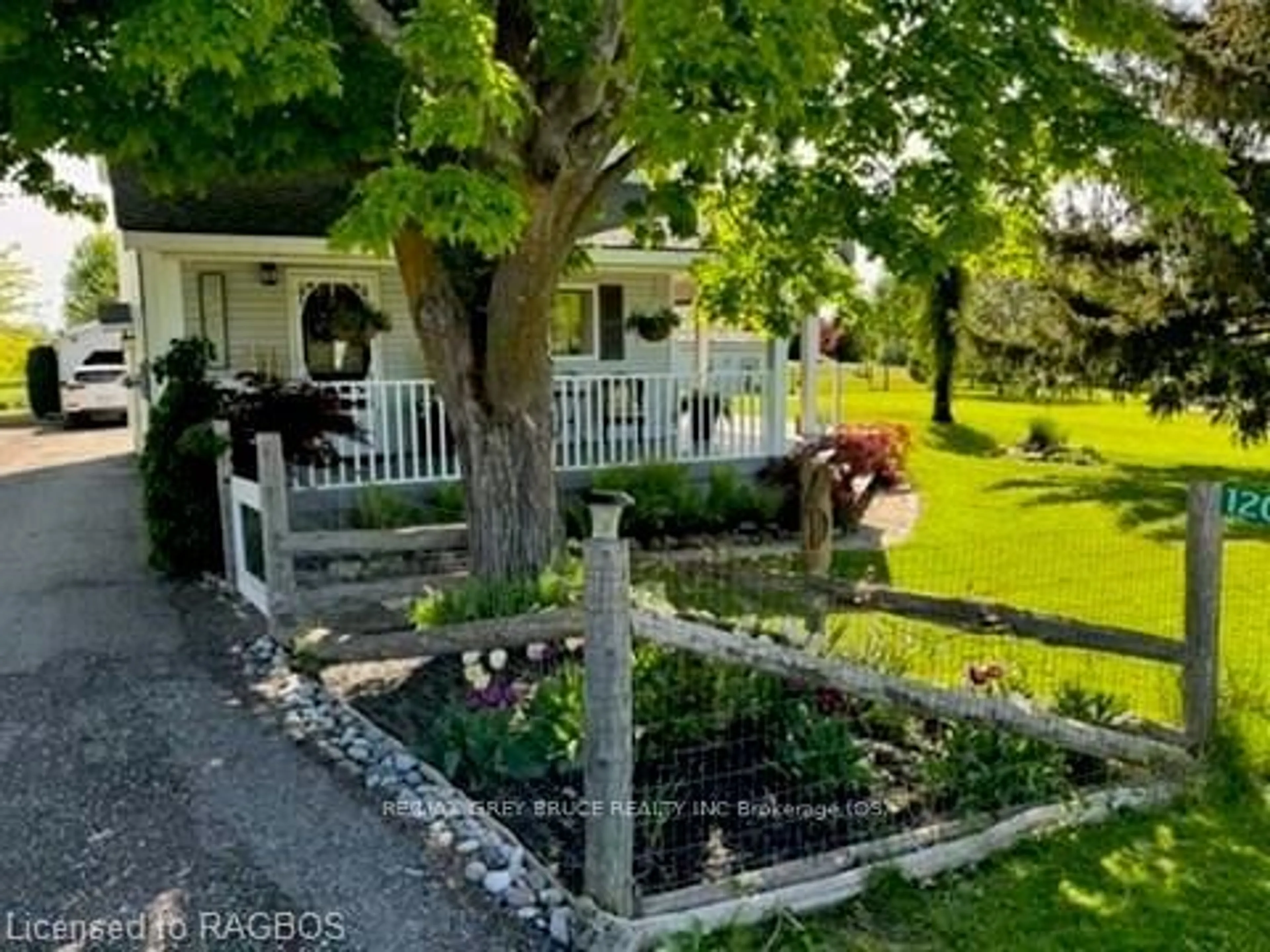 A pic from exterior of the house or condo, the fenced backyard for 120 HAVELOCK St, Georgian Bluffs Ontario N0H 2T0