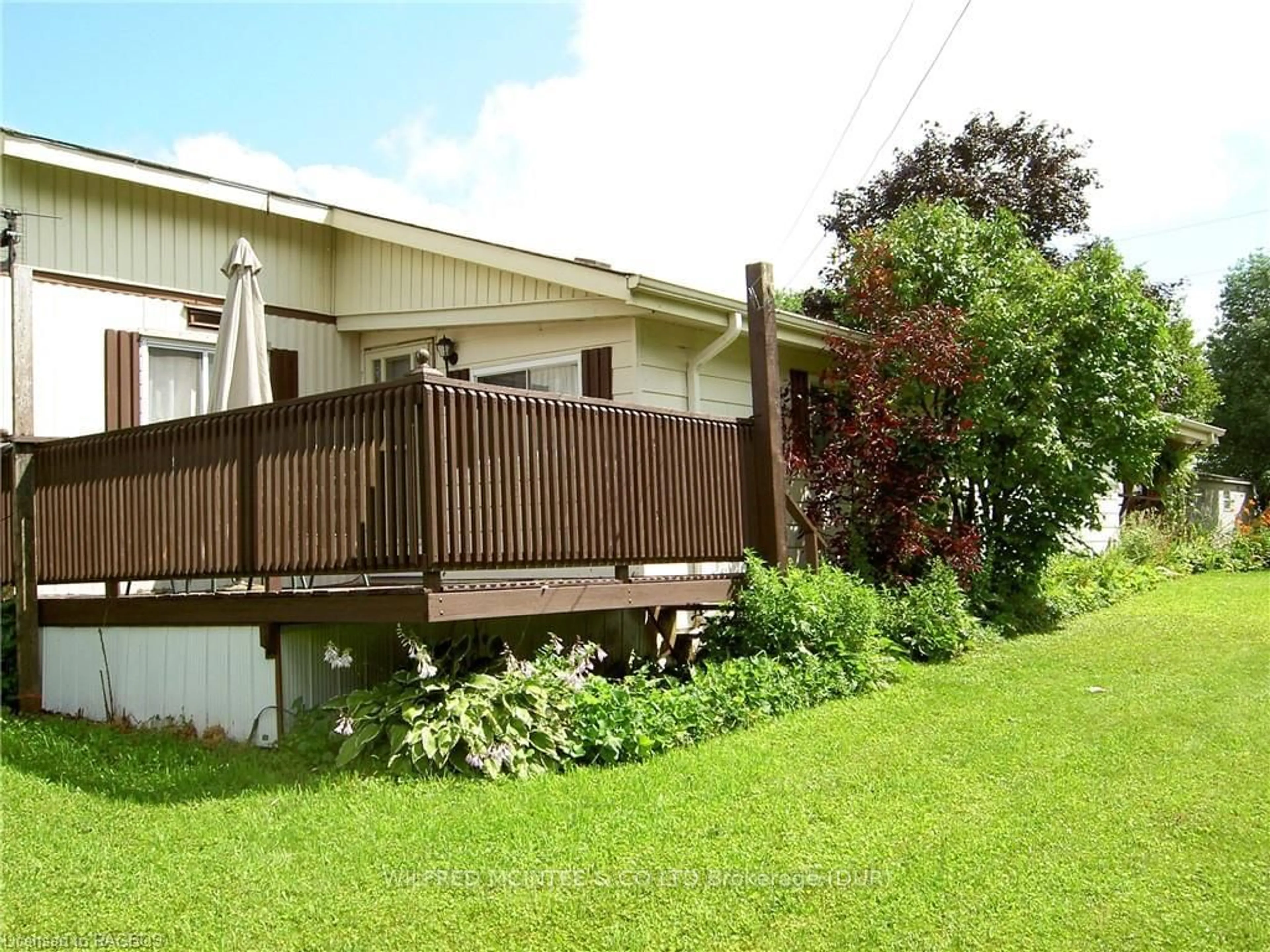 Frontside or backside of a home, the fenced backyard for 302694 DOUGLAS St #53, West Grey Ontario N0G 1R0