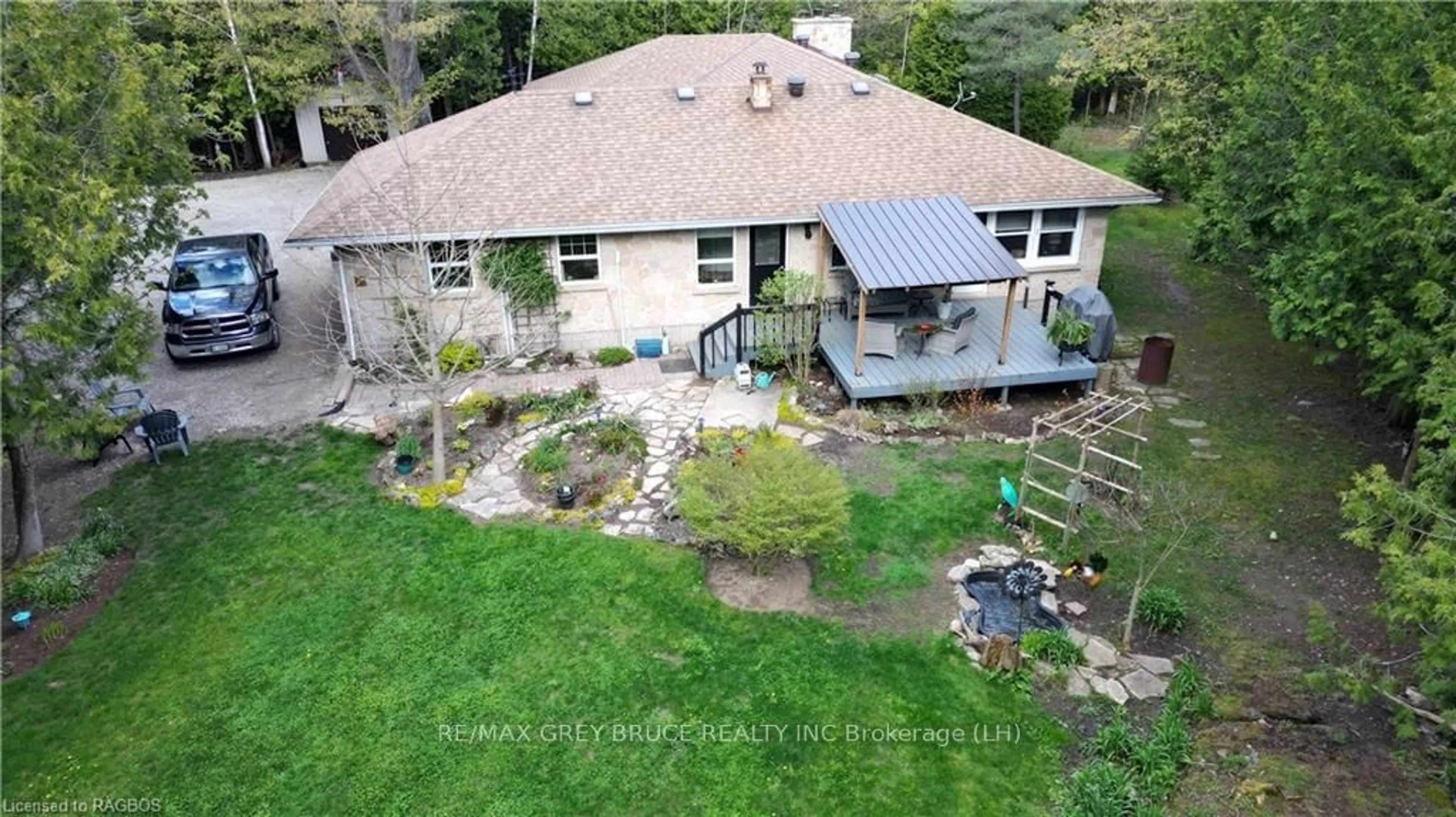 Frontside or backside of a home, the fenced backyard for 328 DYER'S BAY Rd, Northern Bruce Peninsula Ontario N0H 1Z0