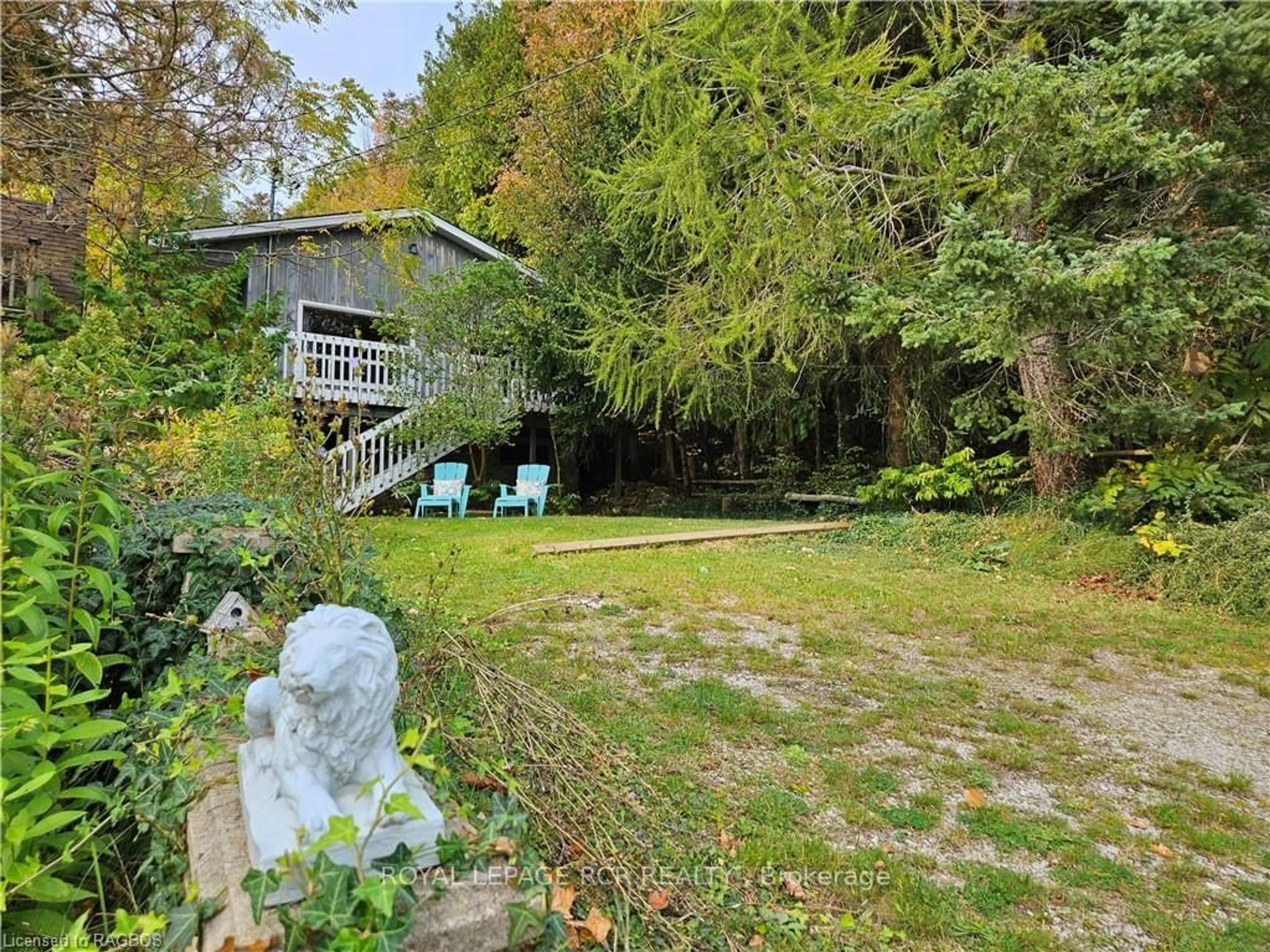 A pic from exterior of the house or condo, the fenced backyard for 28 HELEN St, Northern Bruce Peninsula Ontario N0H 1W0