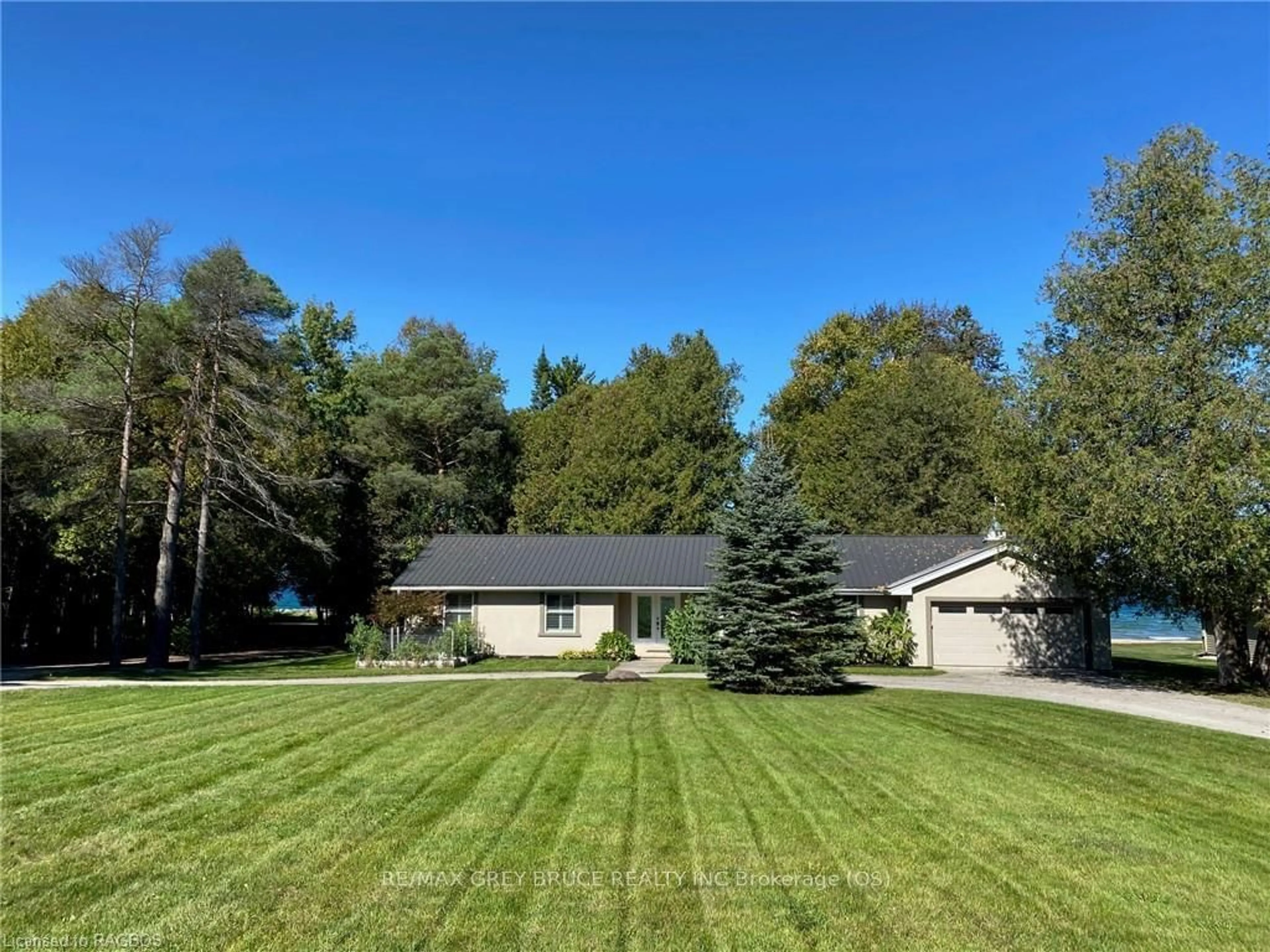 Frontside or backside of a home, the fenced backyard for 359326 GREY ROAD 15, Meaford Ontario N0H 1B0