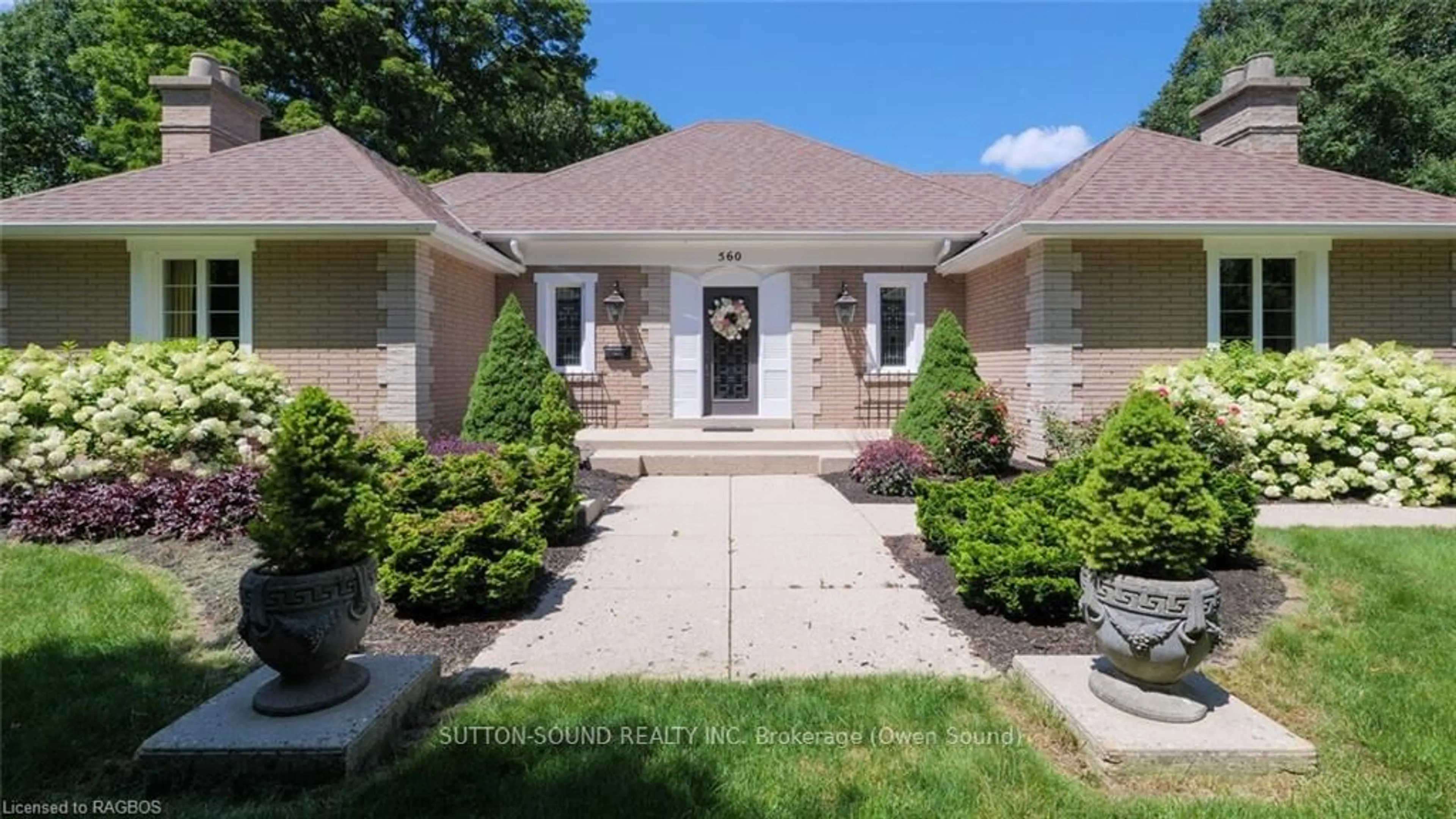 Frontside or backside of a home, the street view for 560 5TH St, Owen Sound Ontario N4K 3K6