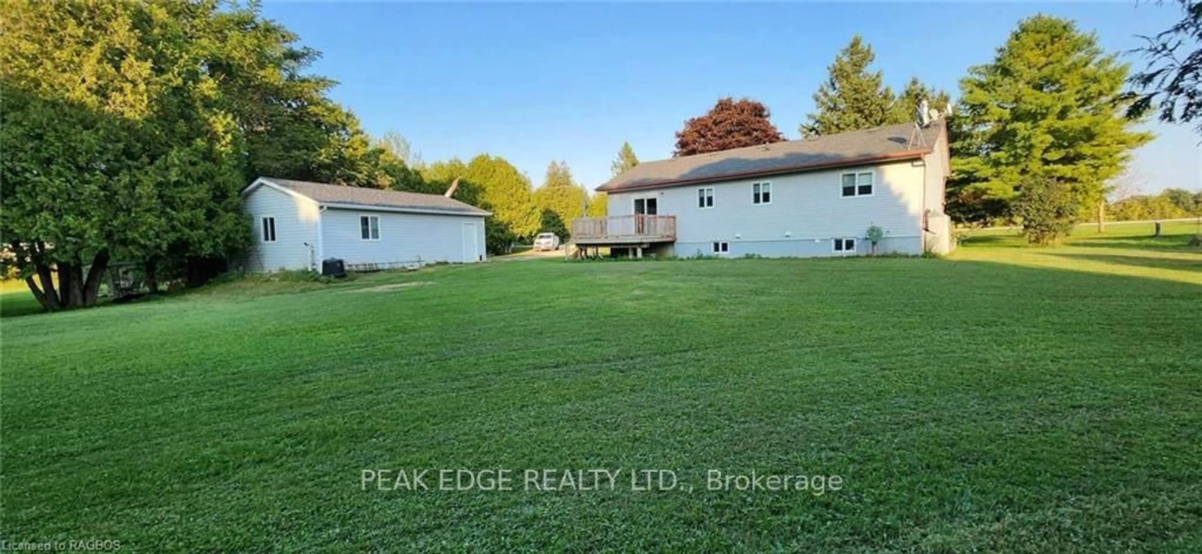 Frontside or backside of a home, the fenced backyard for 9840 BASELINE Rd, Minto Ontario N0G 1M0