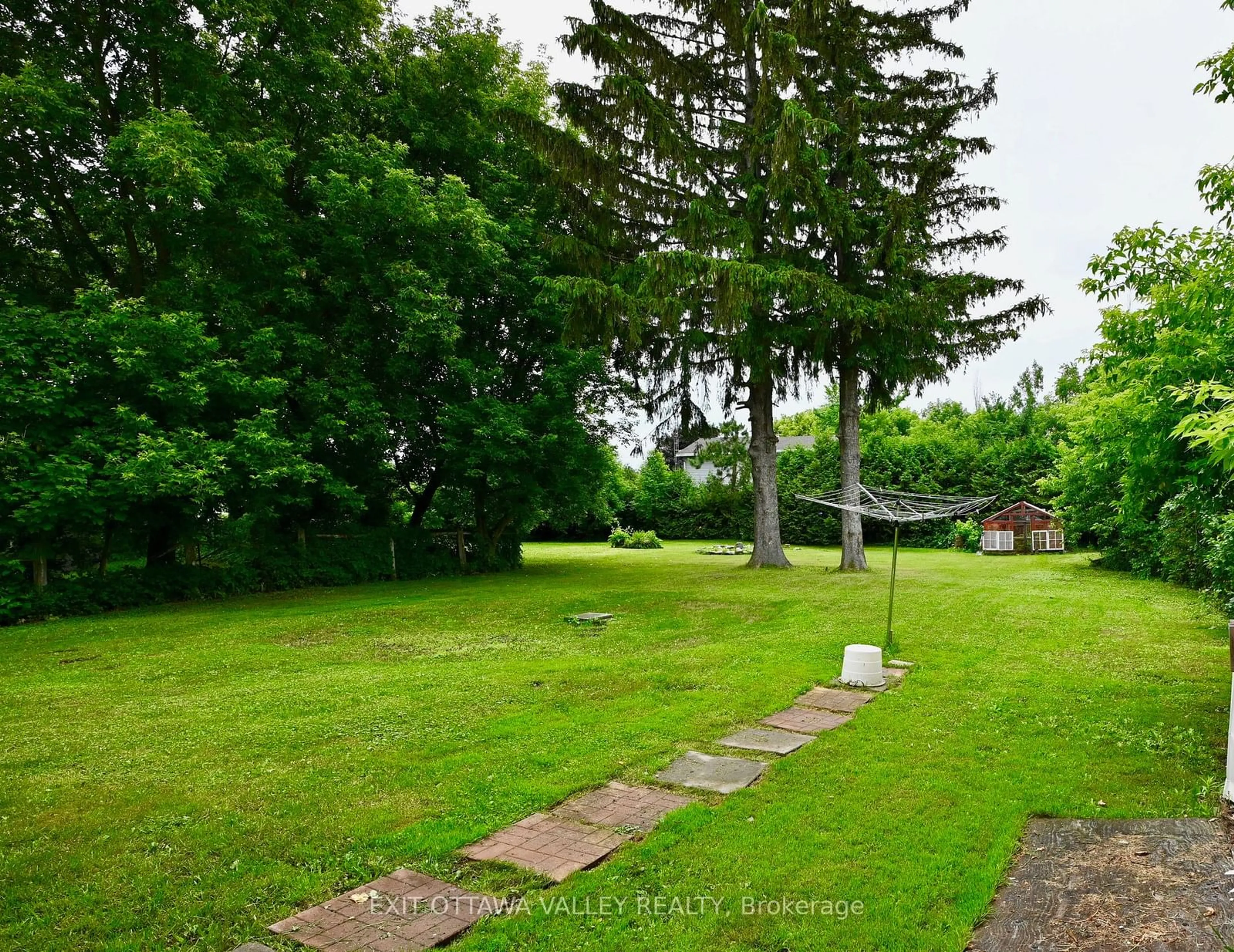 A pic from outside/outdoor area/front of a property/back of a property/a pic from drone, forest/trees view for 27 Grace St, Whitewater Region Ontario K0J 2L0