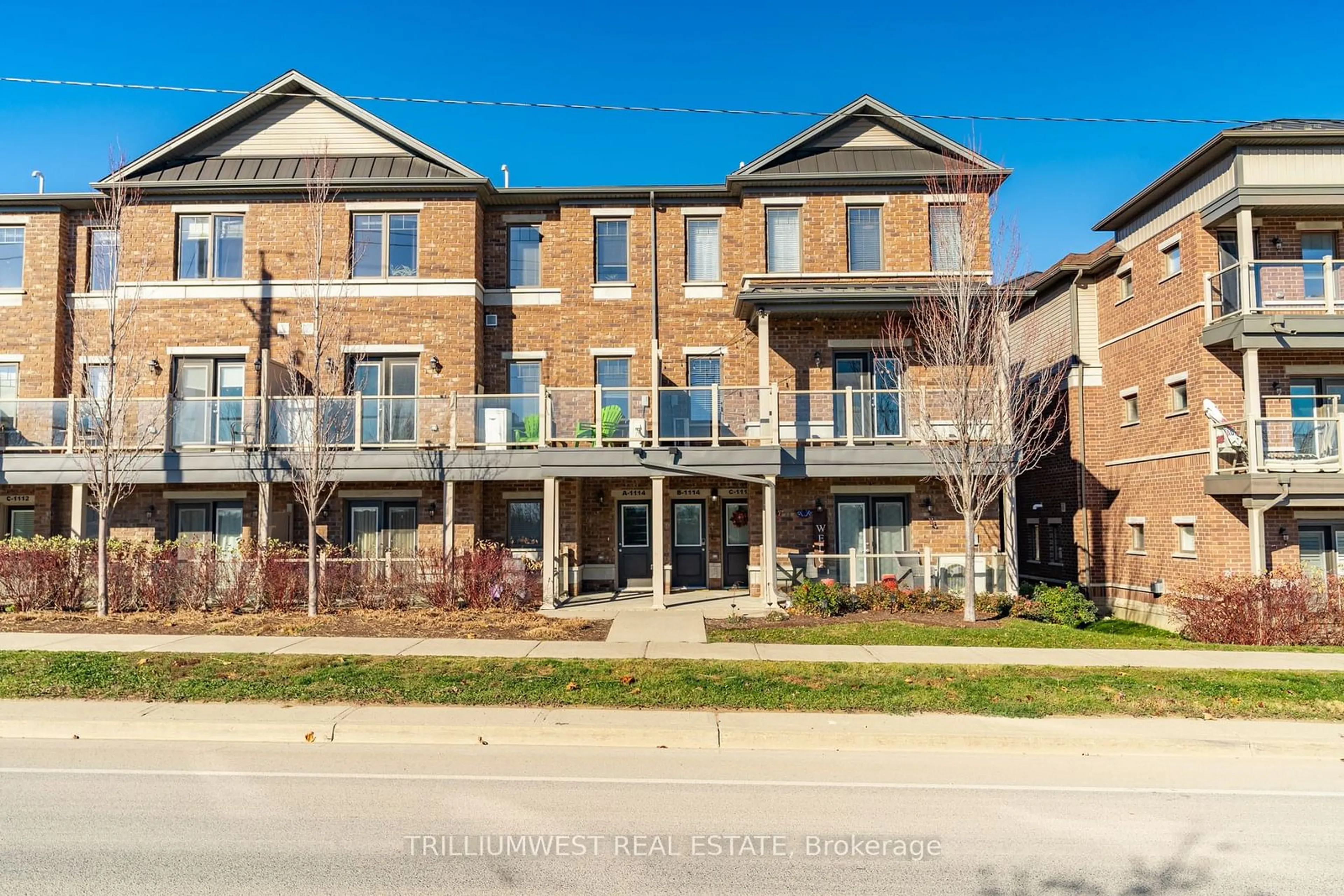 A pic from exterior of the house or condo, the street view for 1114 Fairway Rd #B, Kitchener Ontario N2A 0H6