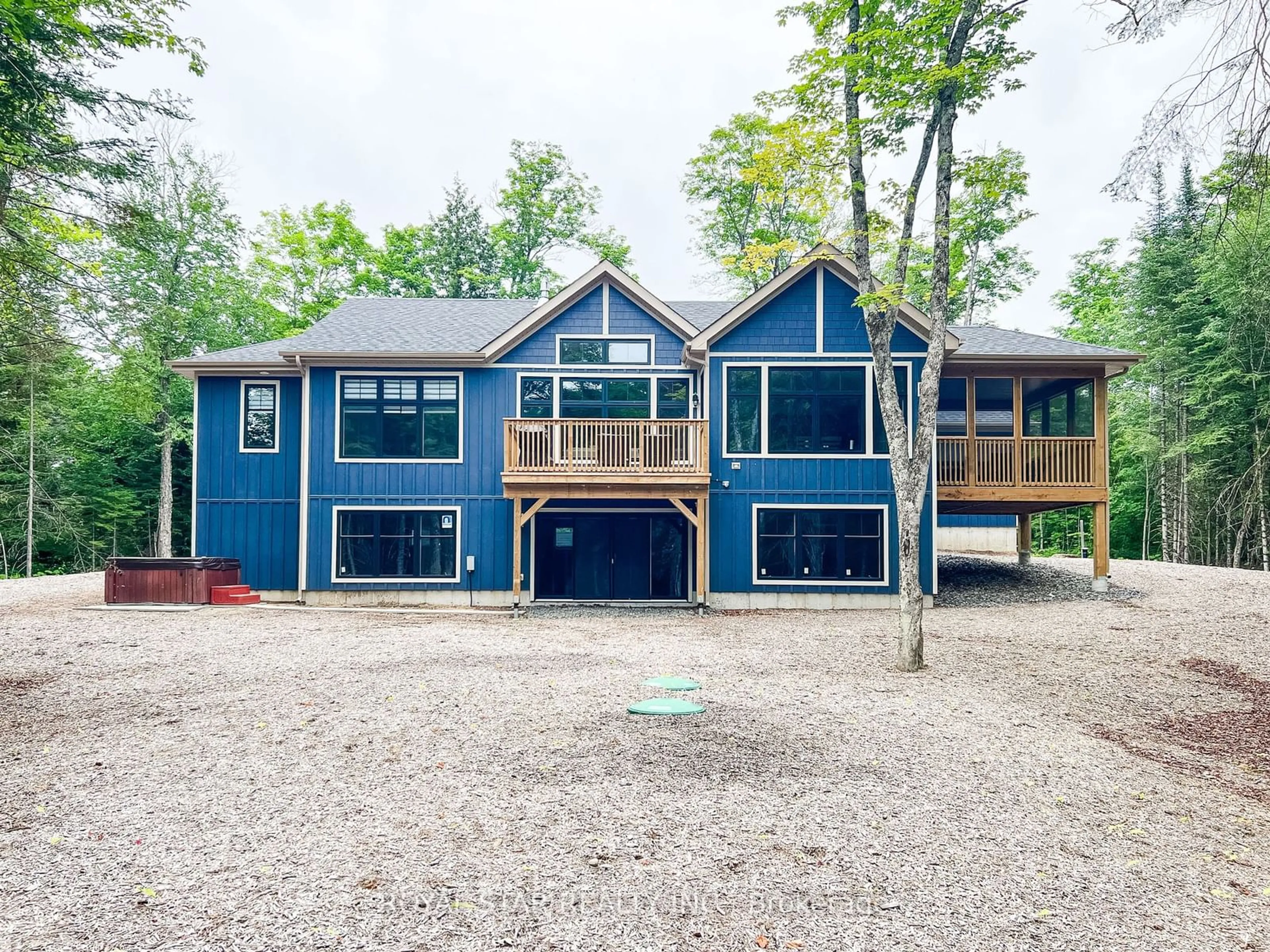 Frontside or backside of a home, cottage for 1004 Boyne Ridge Crt, Huntsville Ontario P1H 0K1