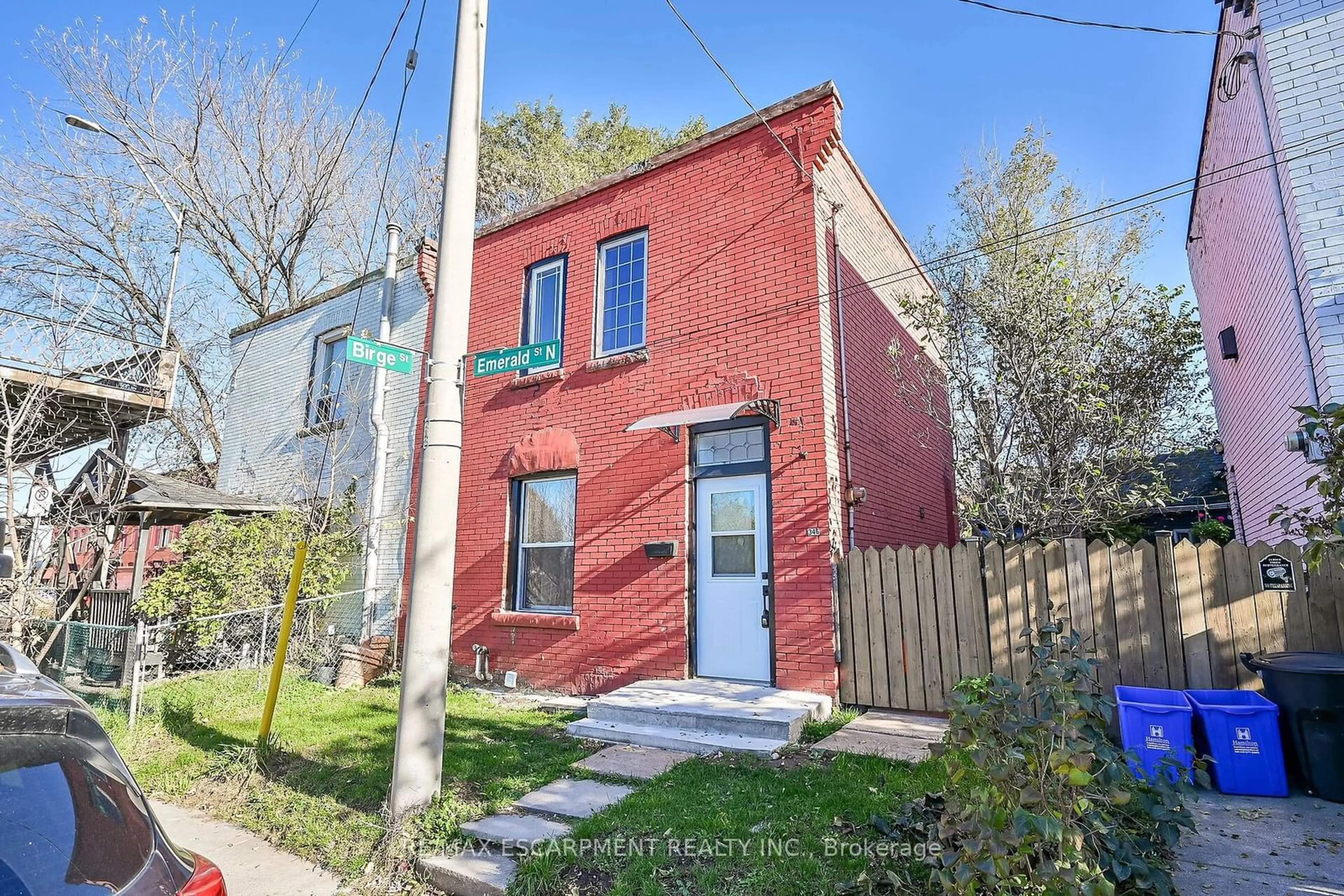 A pic from exterior of the house or condo, the fenced backyard for 346 Emerald St, Hamilton Ontario L8L 5L4