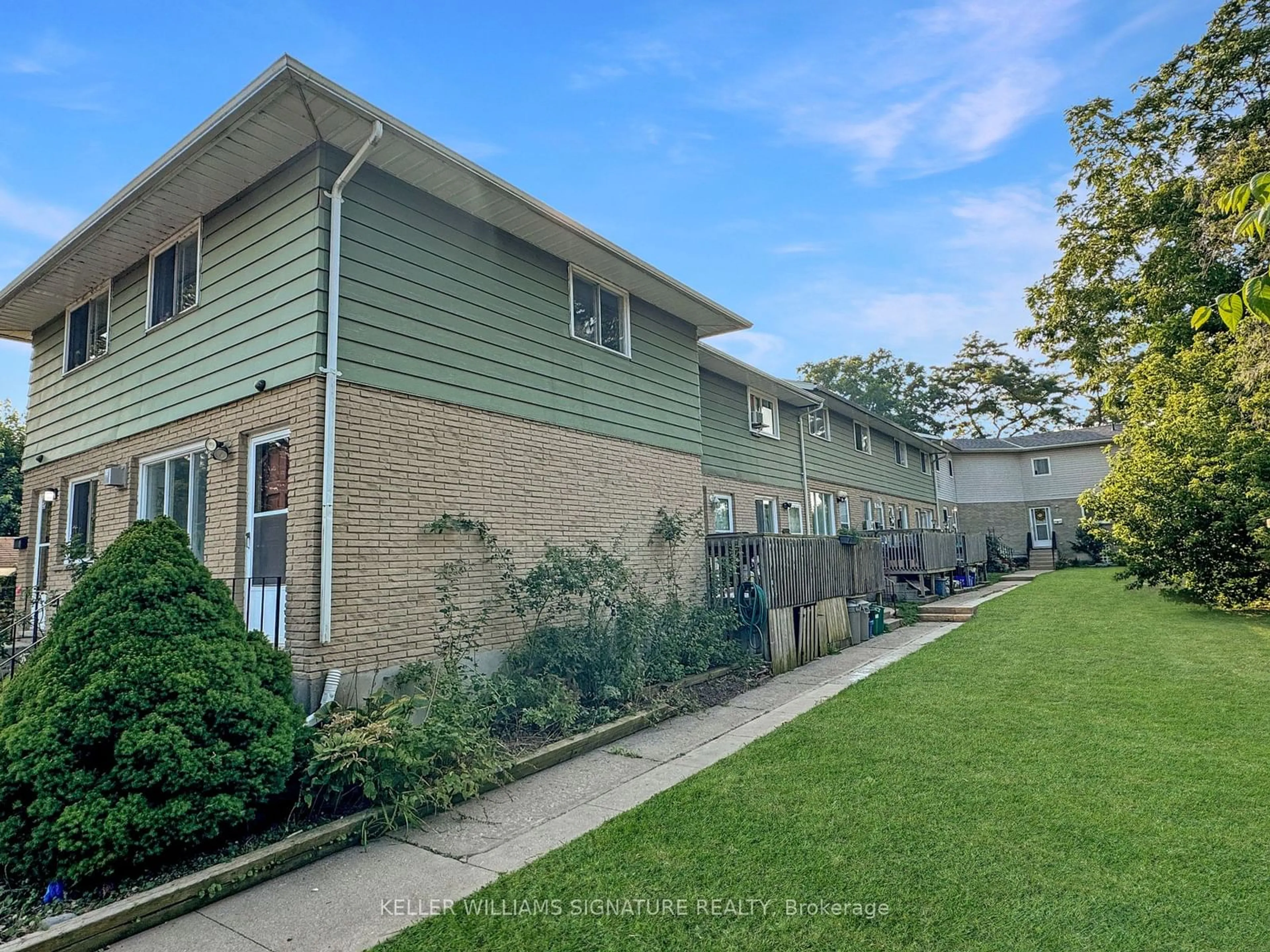 A pic from exterior of the house or condo, the fenced backyard for 120 Beverly St, Cambridge Ontario N1R 3Z7