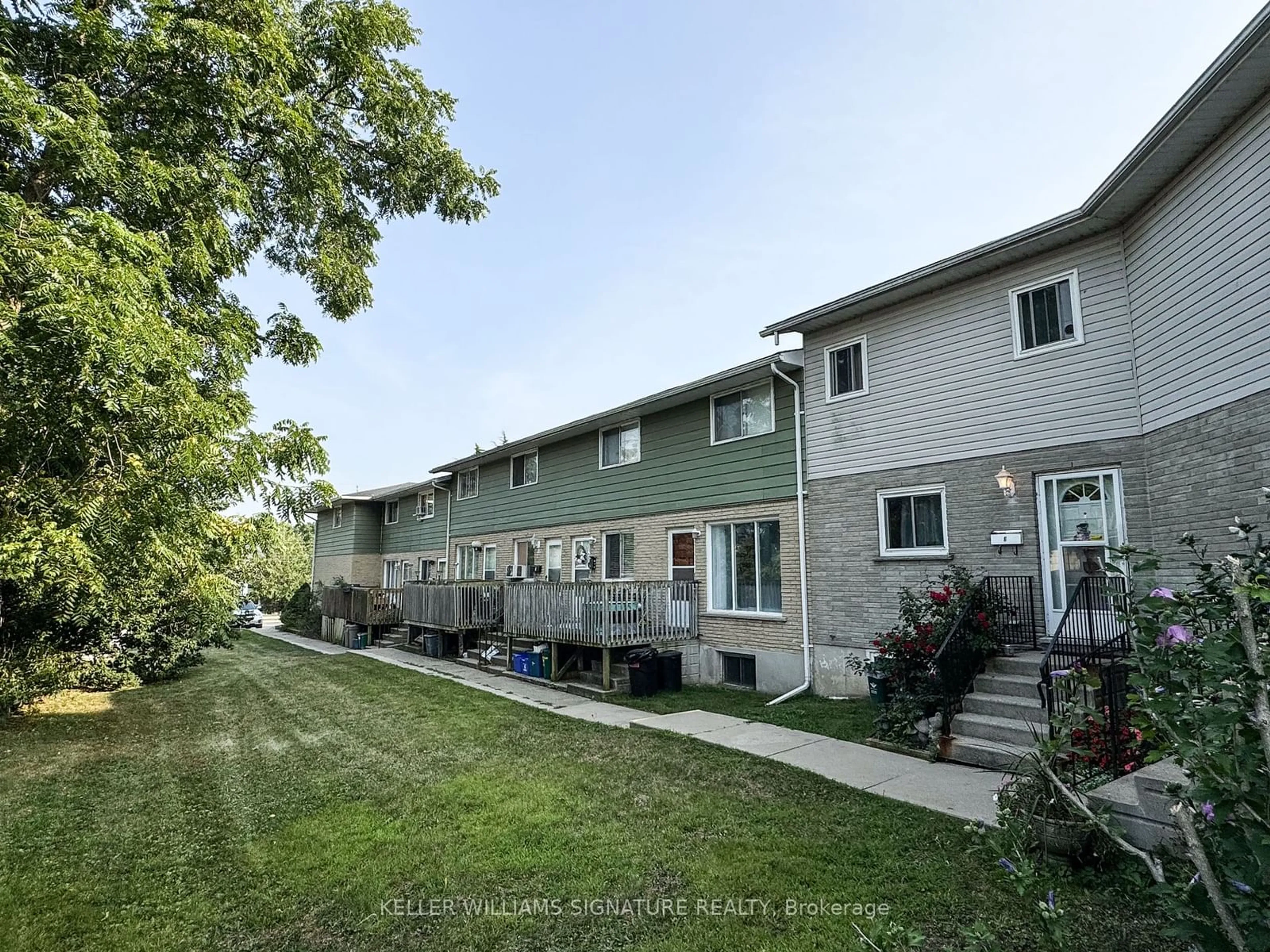 A pic from exterior of the house or condo, the fenced backyard for 120 Beverly St, Cambridge Ontario N1R 3Z7