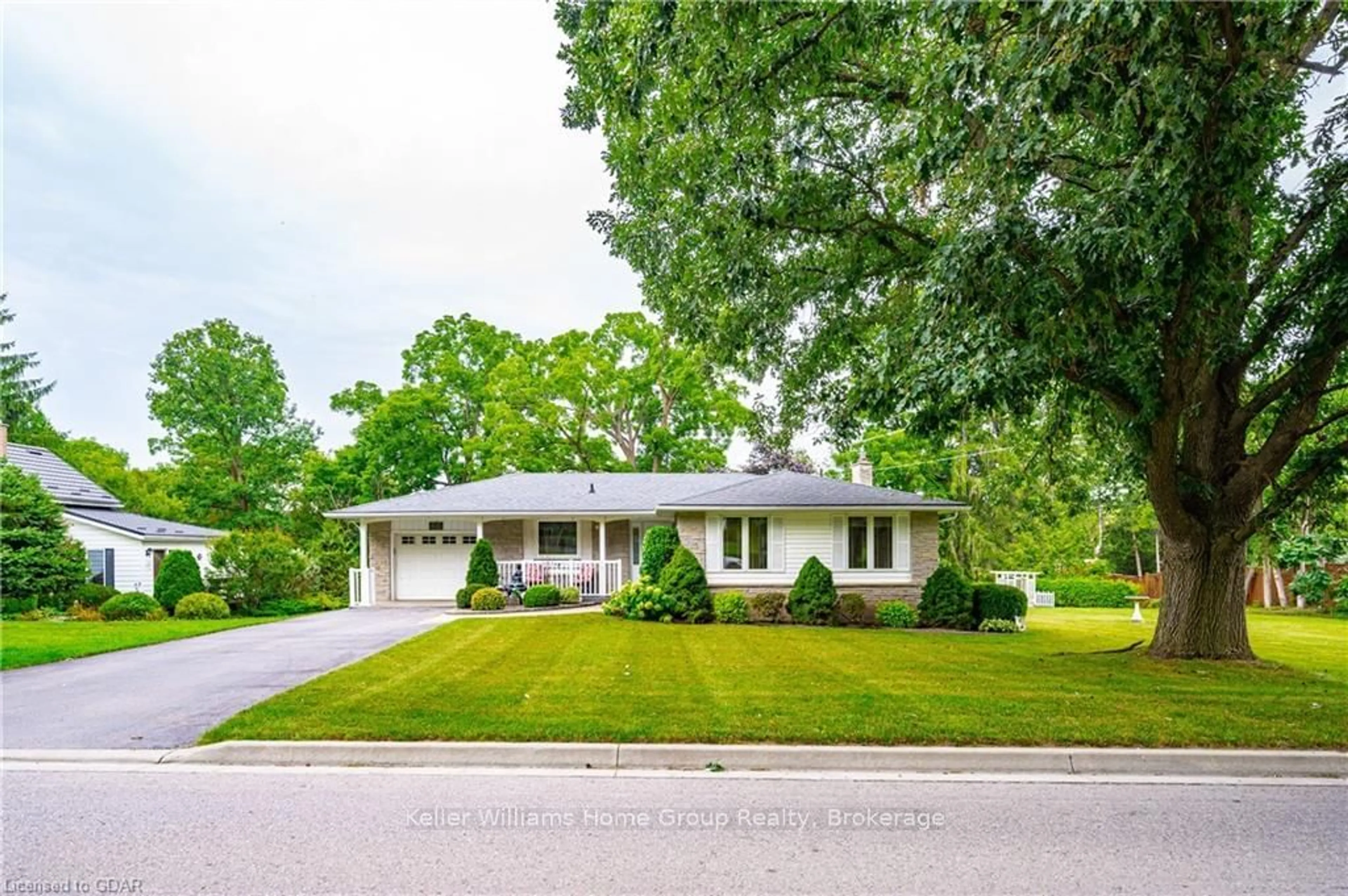 Frontside or backside of a home, the street view for 48 WATER St, Centre Wellington Ontario N0B 1S0