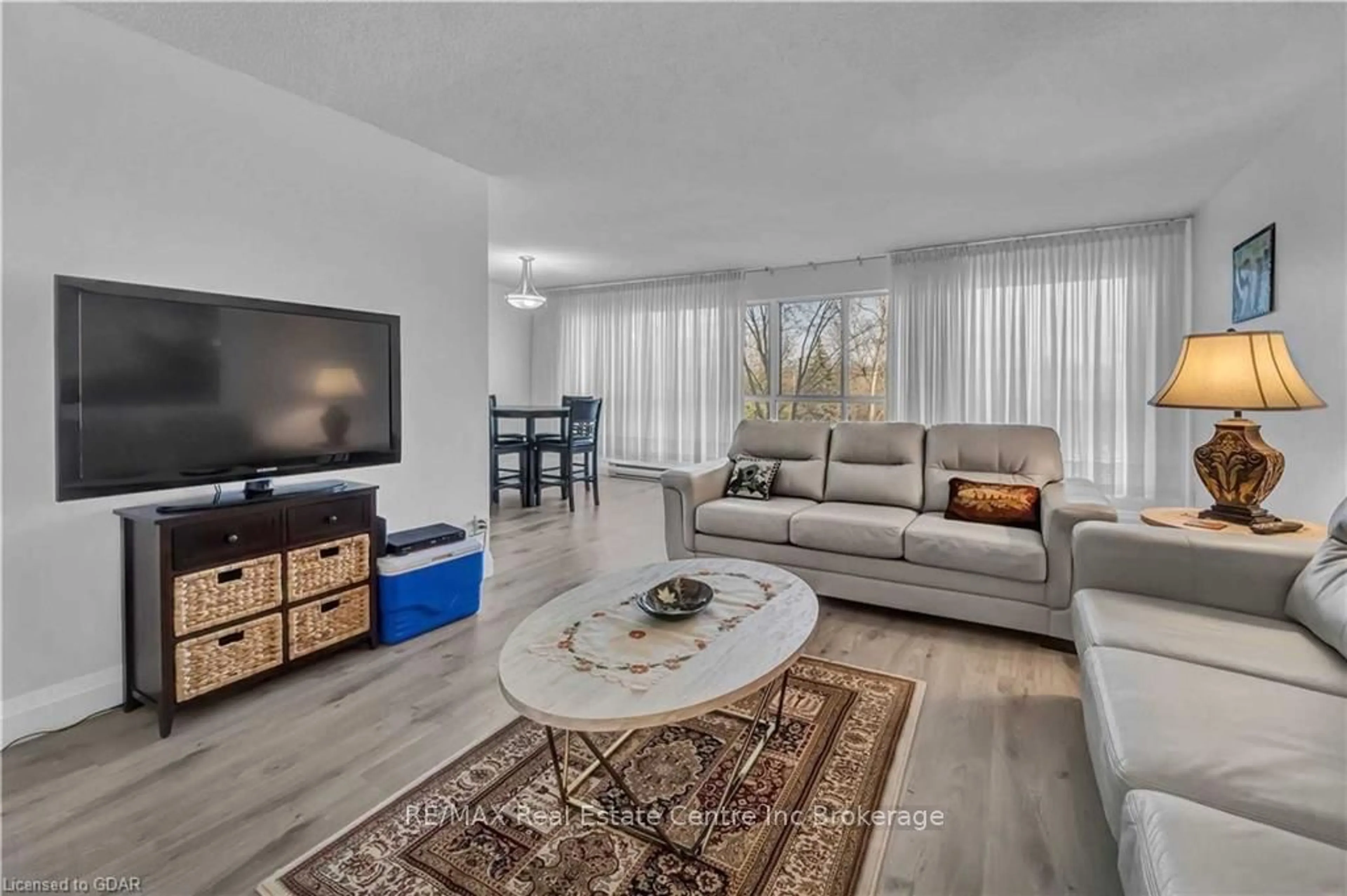 Living room, wood floors for 358 WATERLOO Ave #205, Guelph Ontario N1H 7Y3