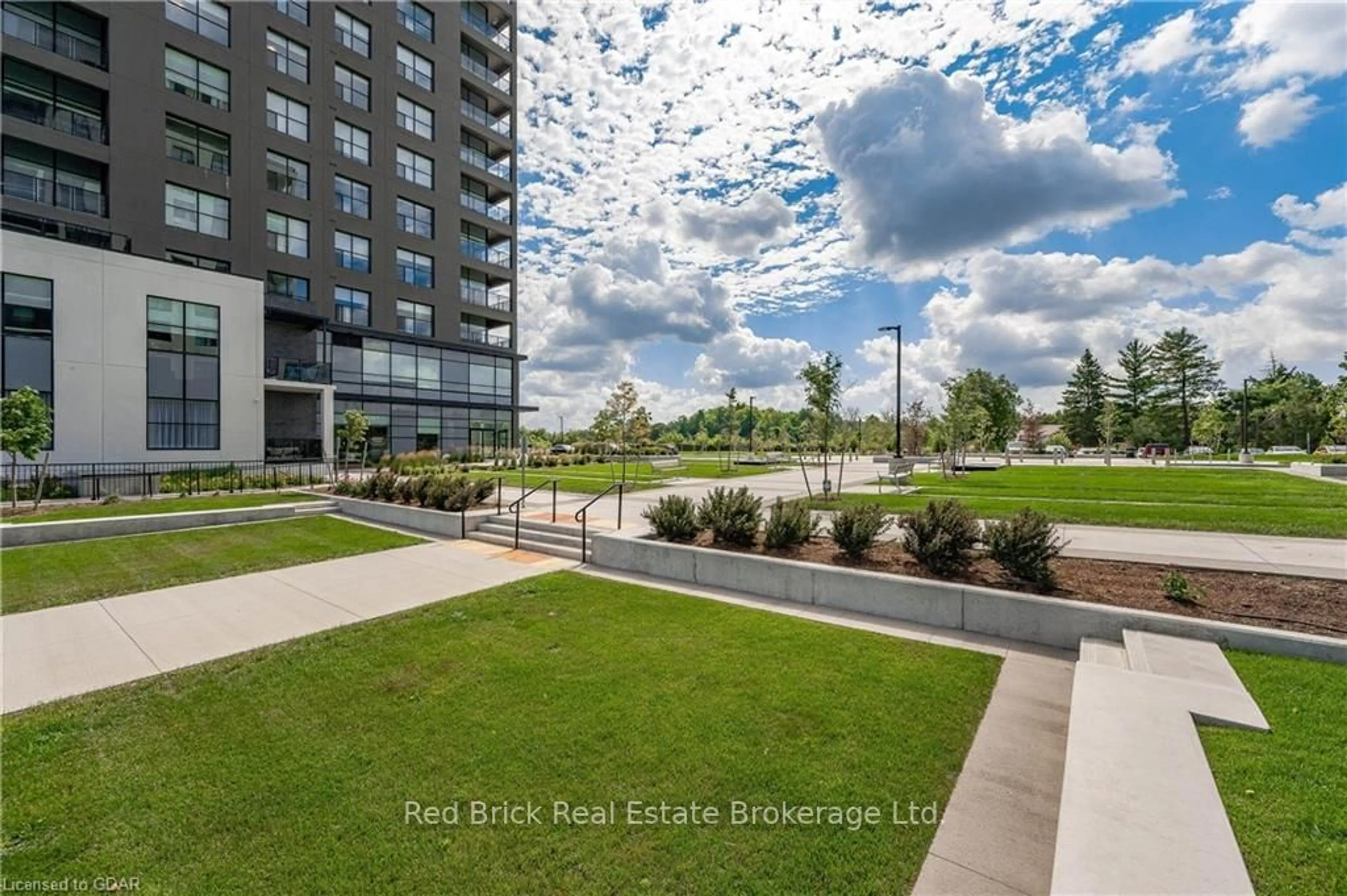 A pic from exterior of the house or condo, the fenced backyard for 1880 GORDON St #805, Guelph Ontario N1L 0P5