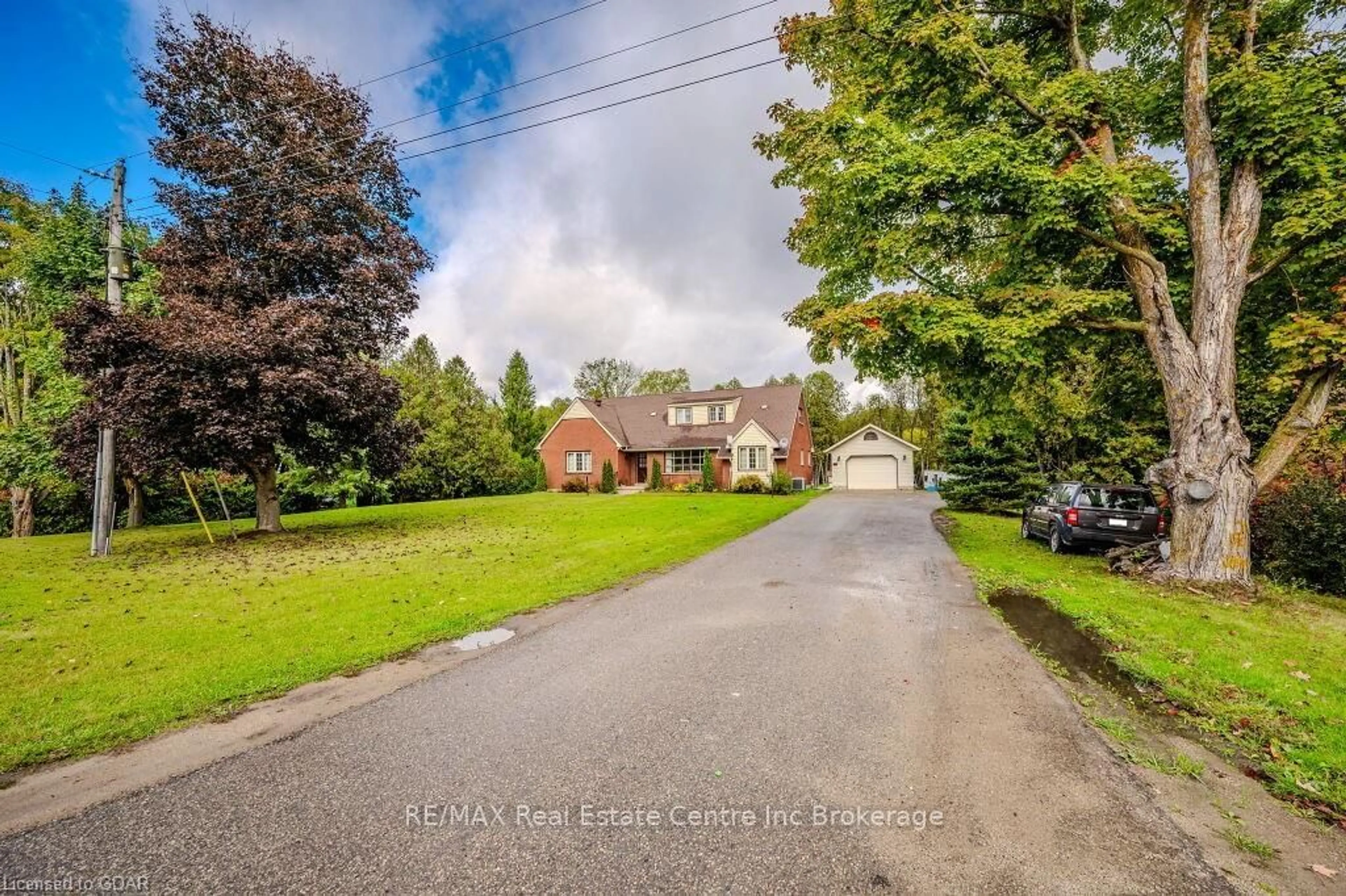 Frontside or backside of a home, the street view for 403115 GREY ROAD 4, West Grey Ontario N0G 1R0