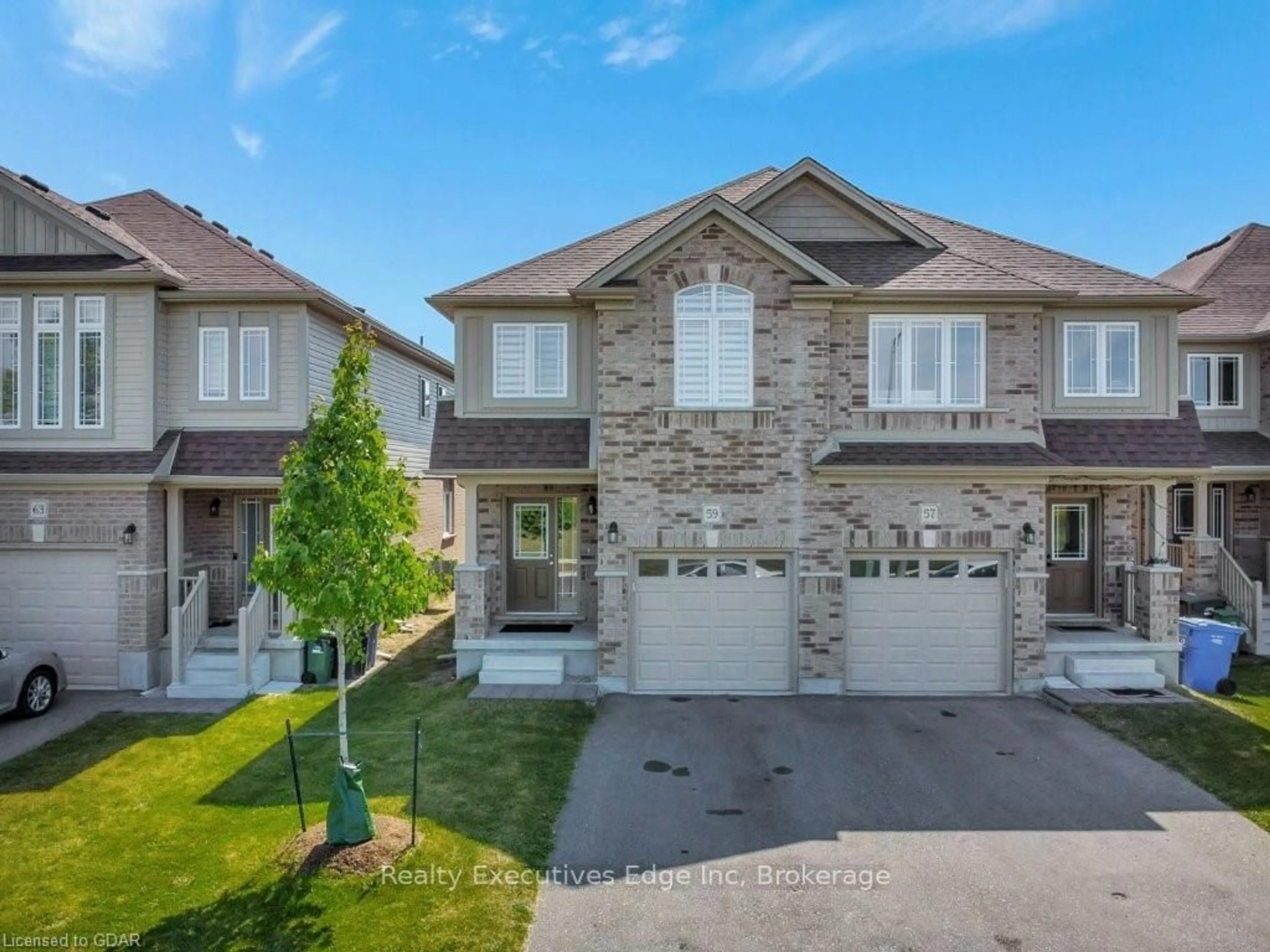 Frontside or backside of a home, the street view for 59 JOHN BRABSON Cres, Guelph Ontario N1G 0G5