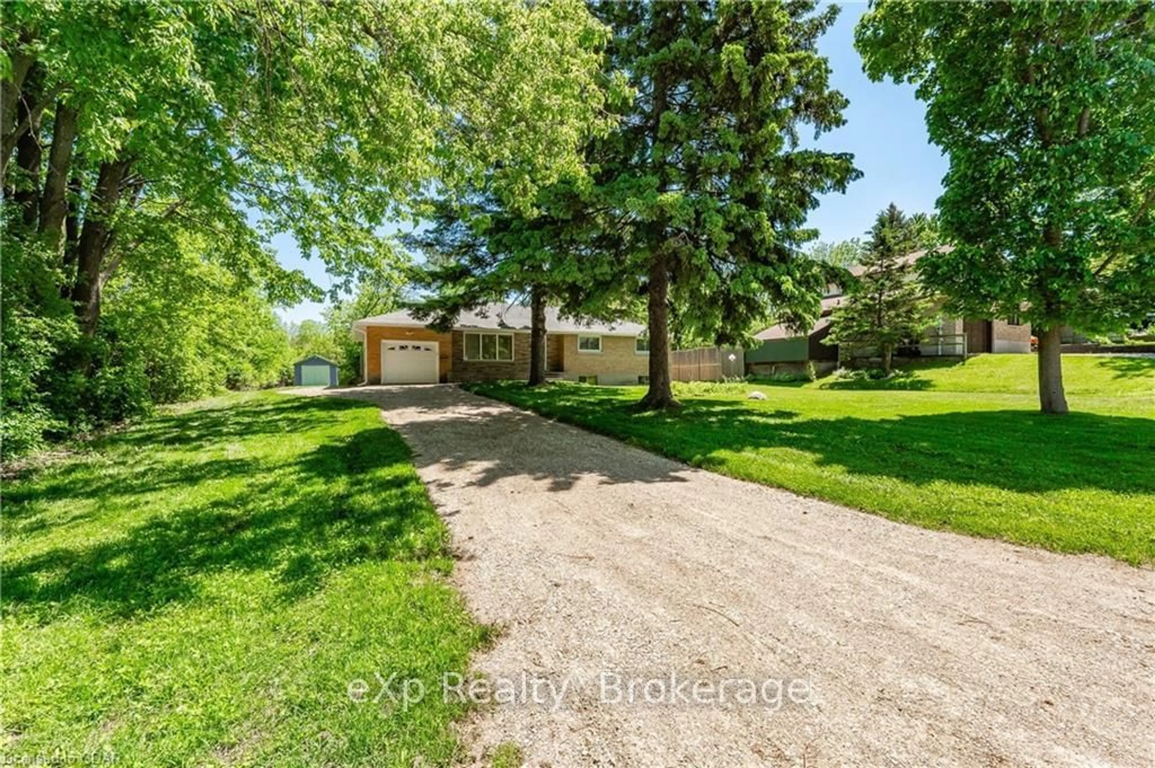 Frontside or backside of a home, the fenced backyard for 47 HYLAND Rd, Guelph Ontario N1E 1T2