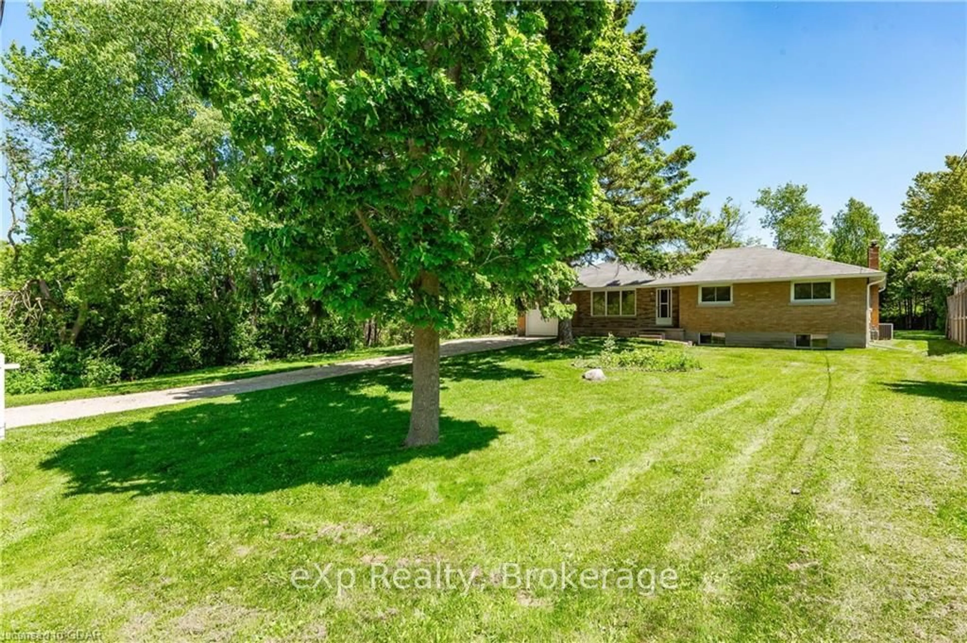 Frontside or backside of a home, the fenced backyard for 47 HYLAND Rd, Guelph Ontario N1E 1T2
