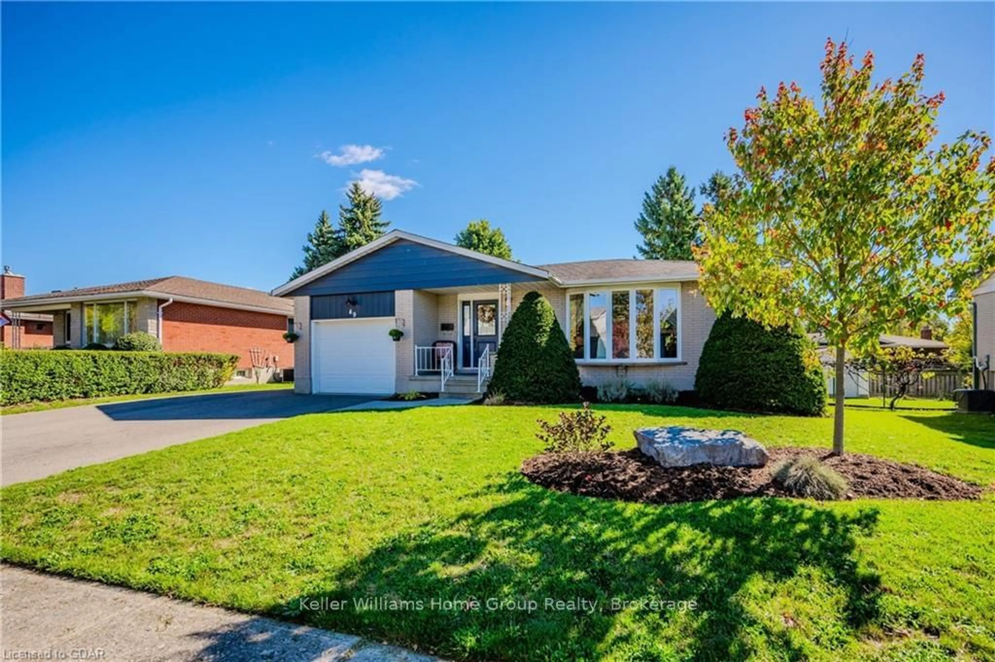 Frontside or backside of a home, the fenced backyard for 49 STRATHCONA Cres, Kitchener Ontario N2B 2W8