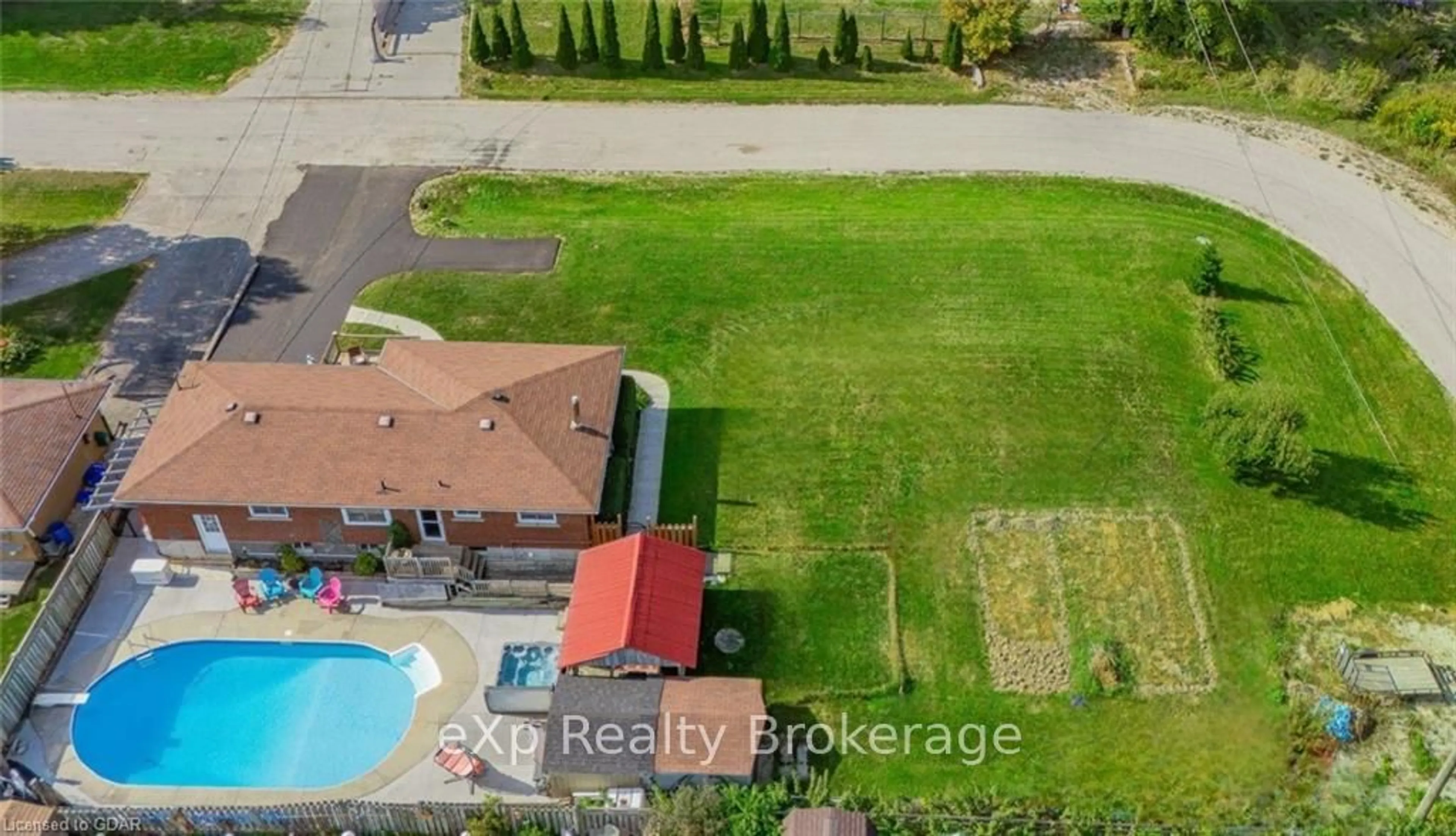 Frontside or backside of a home, the fenced backyard for 231 CHAMBERS Cres, Centre Wellington Ontario N1M 3E4