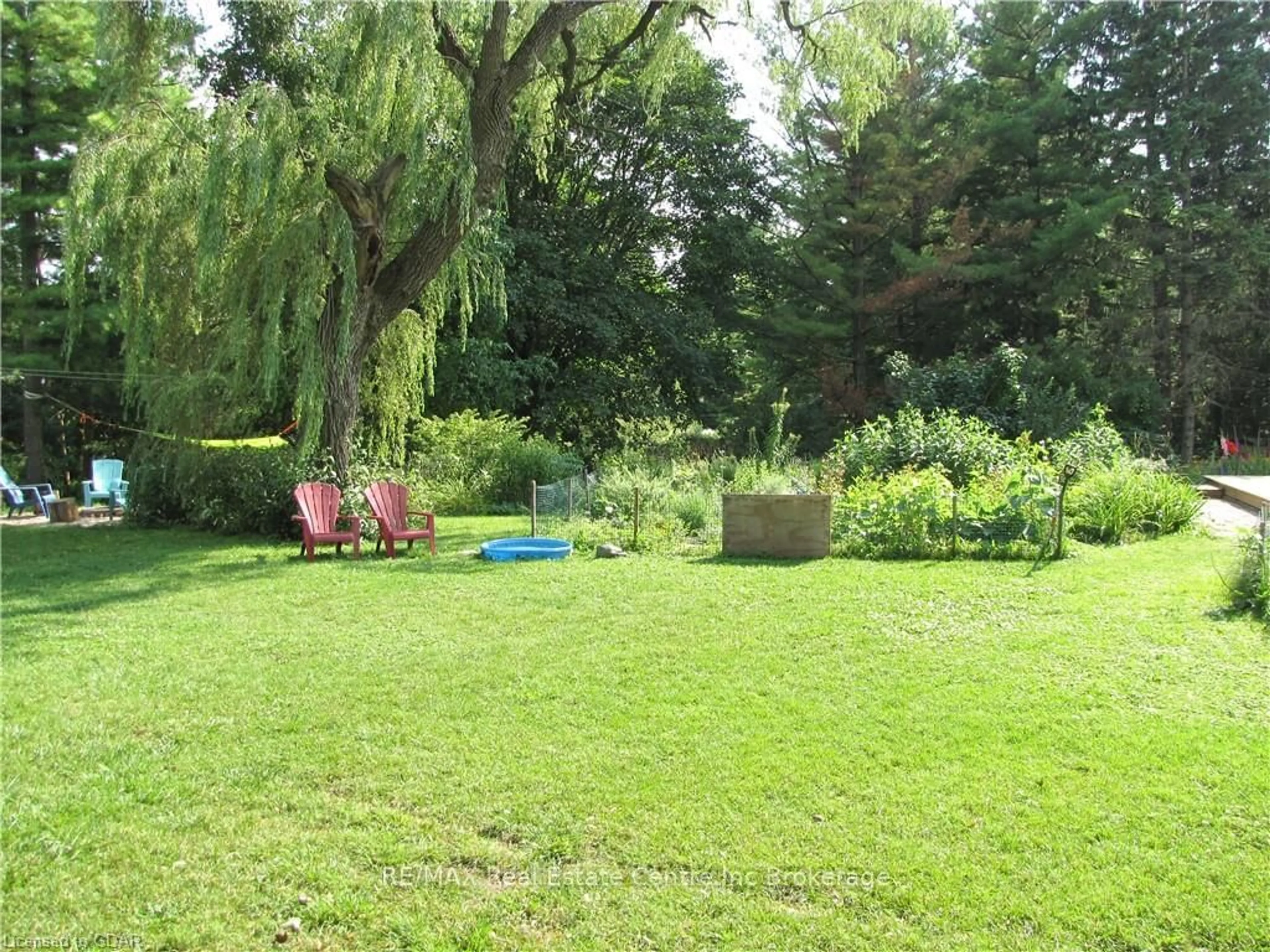 Patio, the fenced backyard for 102 EMMA St, Guelph Ontario N1E 1T8