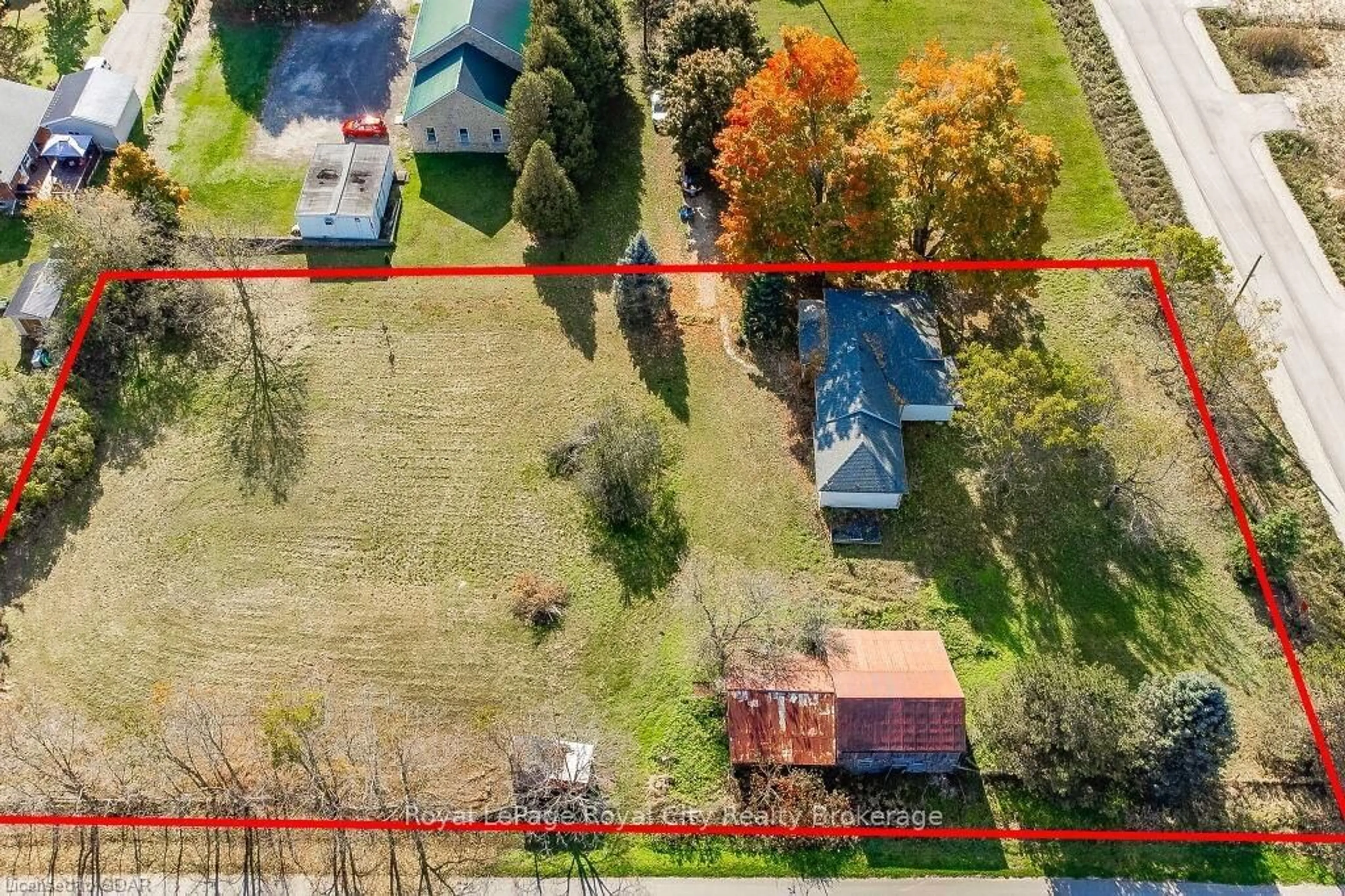 Frontside or backside of a home, the fenced backyard for 387 EVERT St, Guelph/Eramosa Ontario N0B 2K0