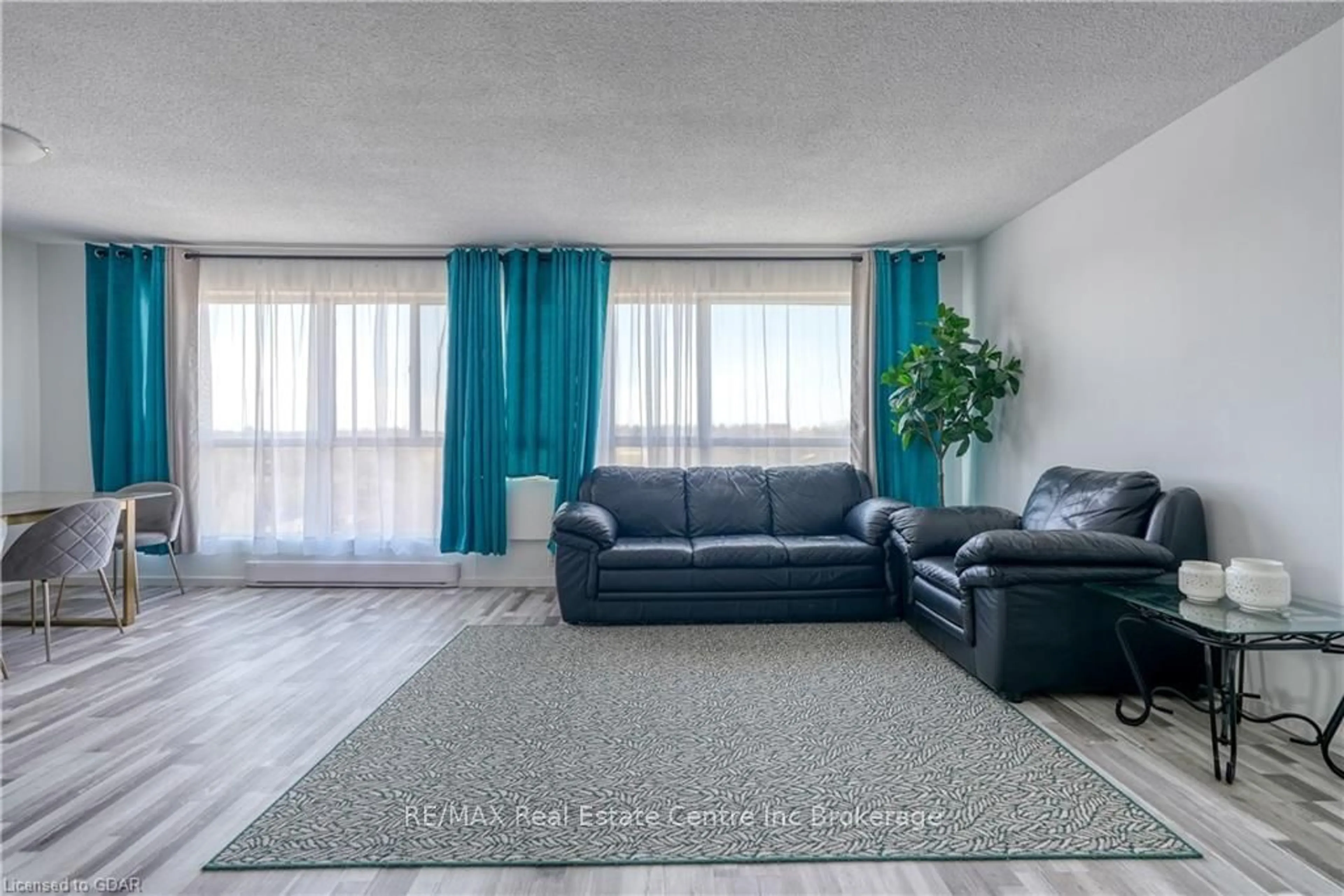 Living room, carpet floors for 358 WATERLOO Ave #1101, Guelph Ontario N1H 7Y3