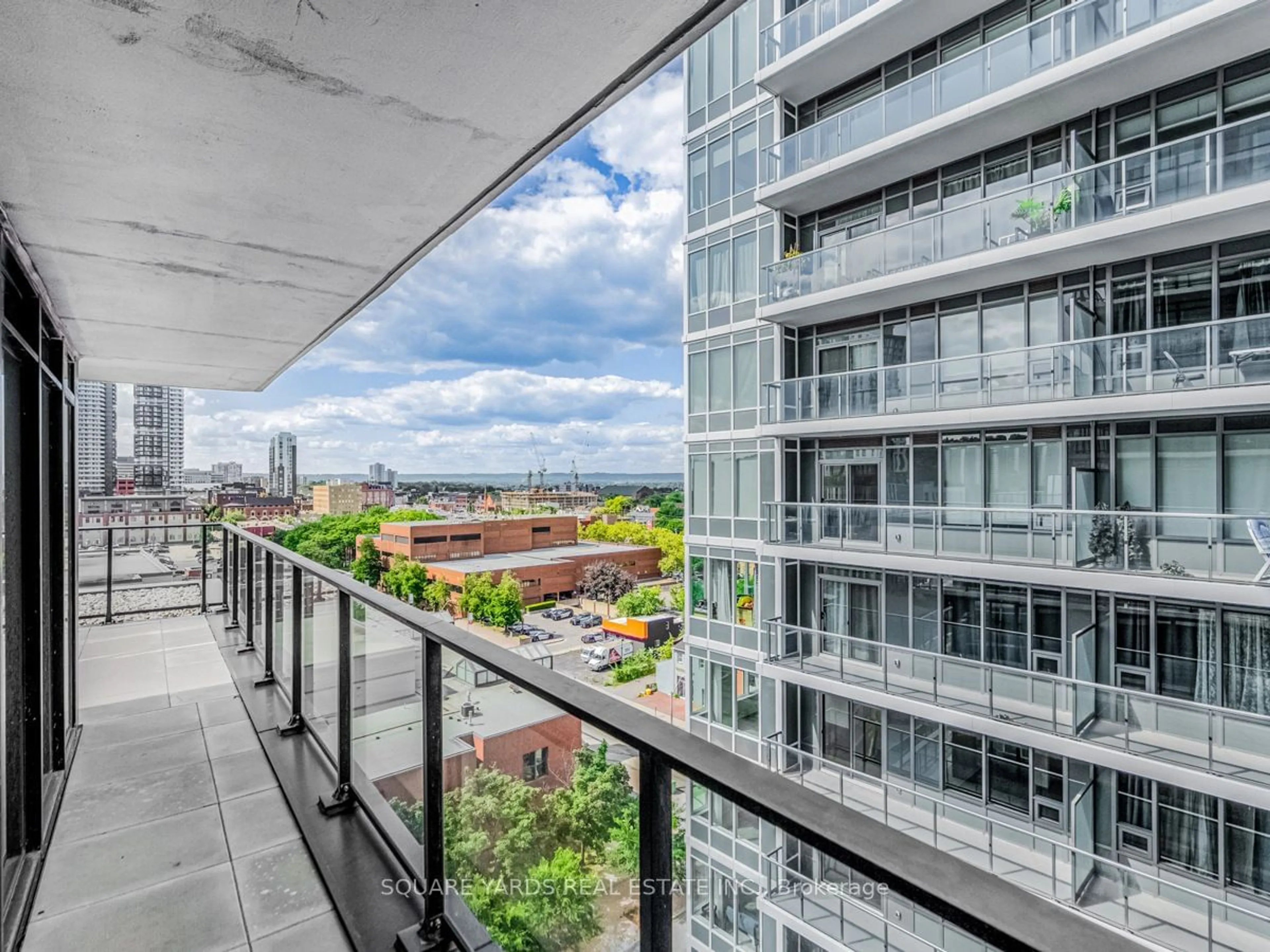 Balcony in the apartment, the view of city buildings for 1 Jarvis St #1010, Hamilton Ontario L8R 3J2