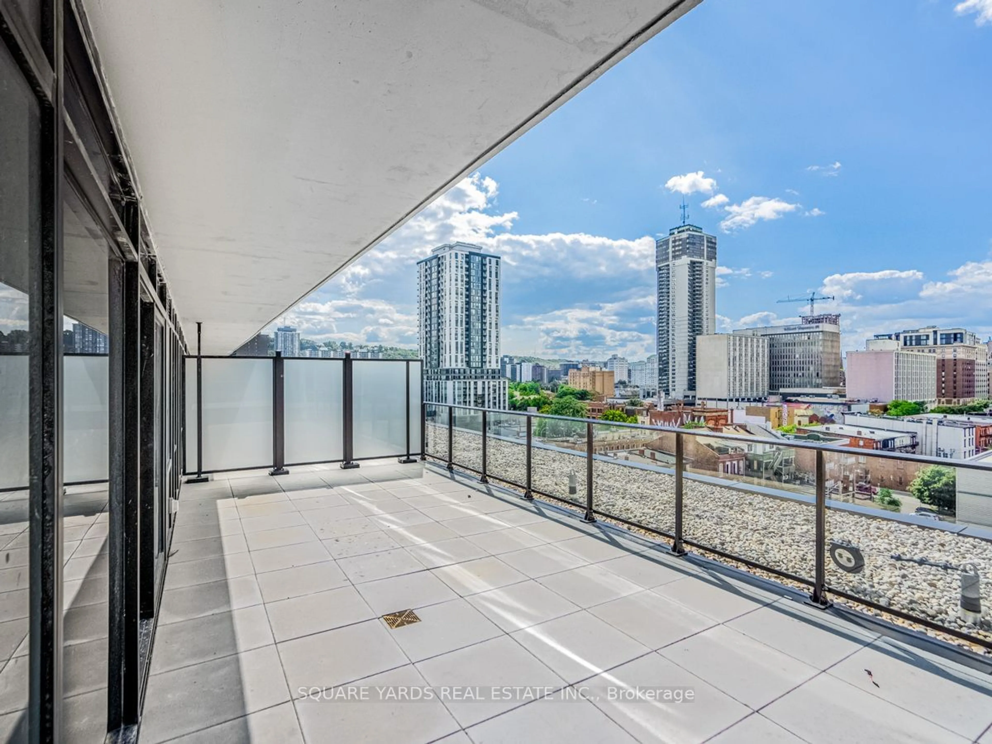 Balcony in the apartment, the view of city buildings for 1 Jarvis St #1010, Hamilton Ontario L8R 3J2