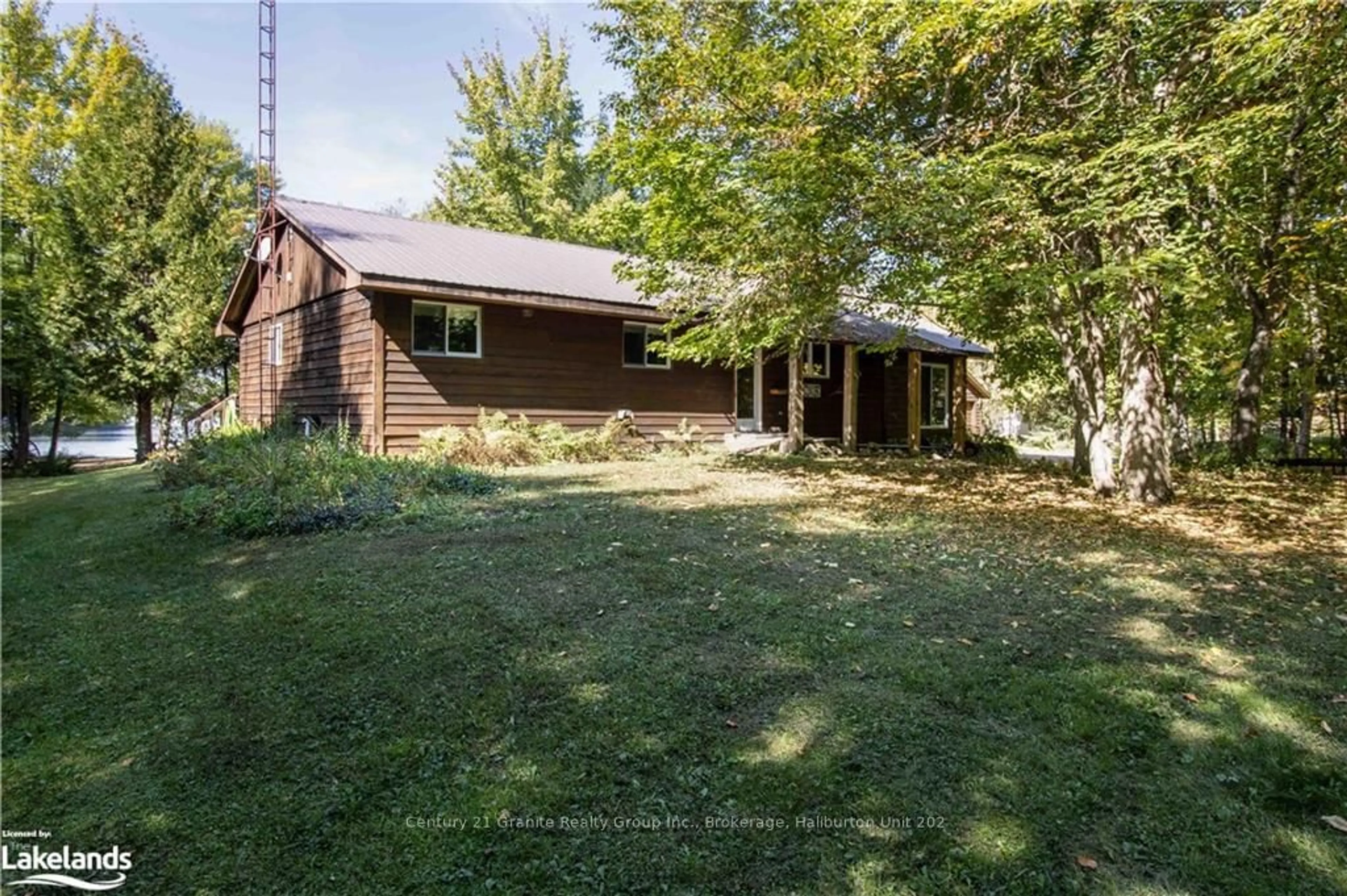 Frontside or backside of a home, cottage for 1054 The Narrows Tr, Minden Hills Ontario K0M 2K0