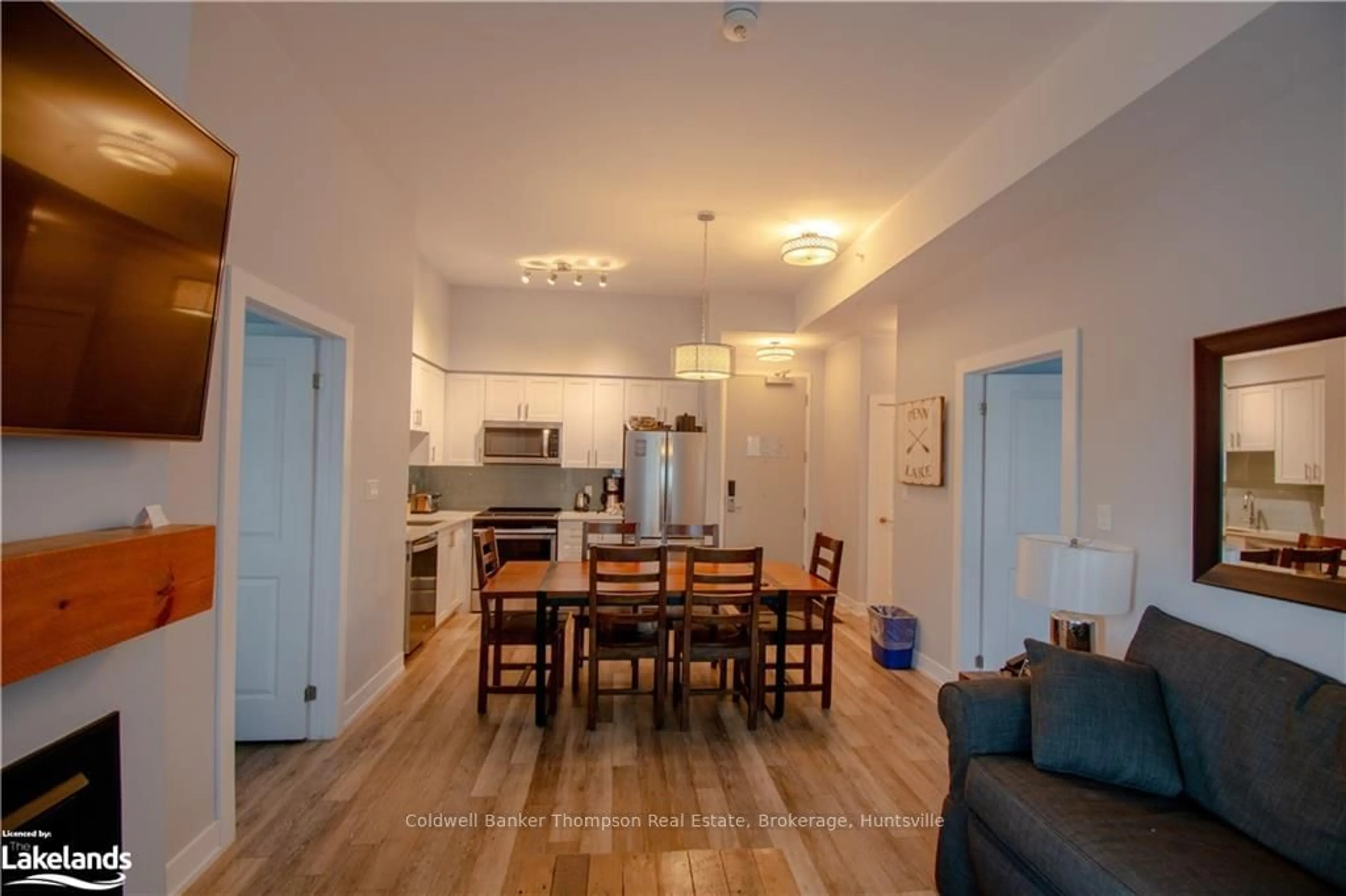 A pic of a room, wood floors for 25 PEN LAKE POINT Rd #003, Huntsville Ontario P1H 1A9