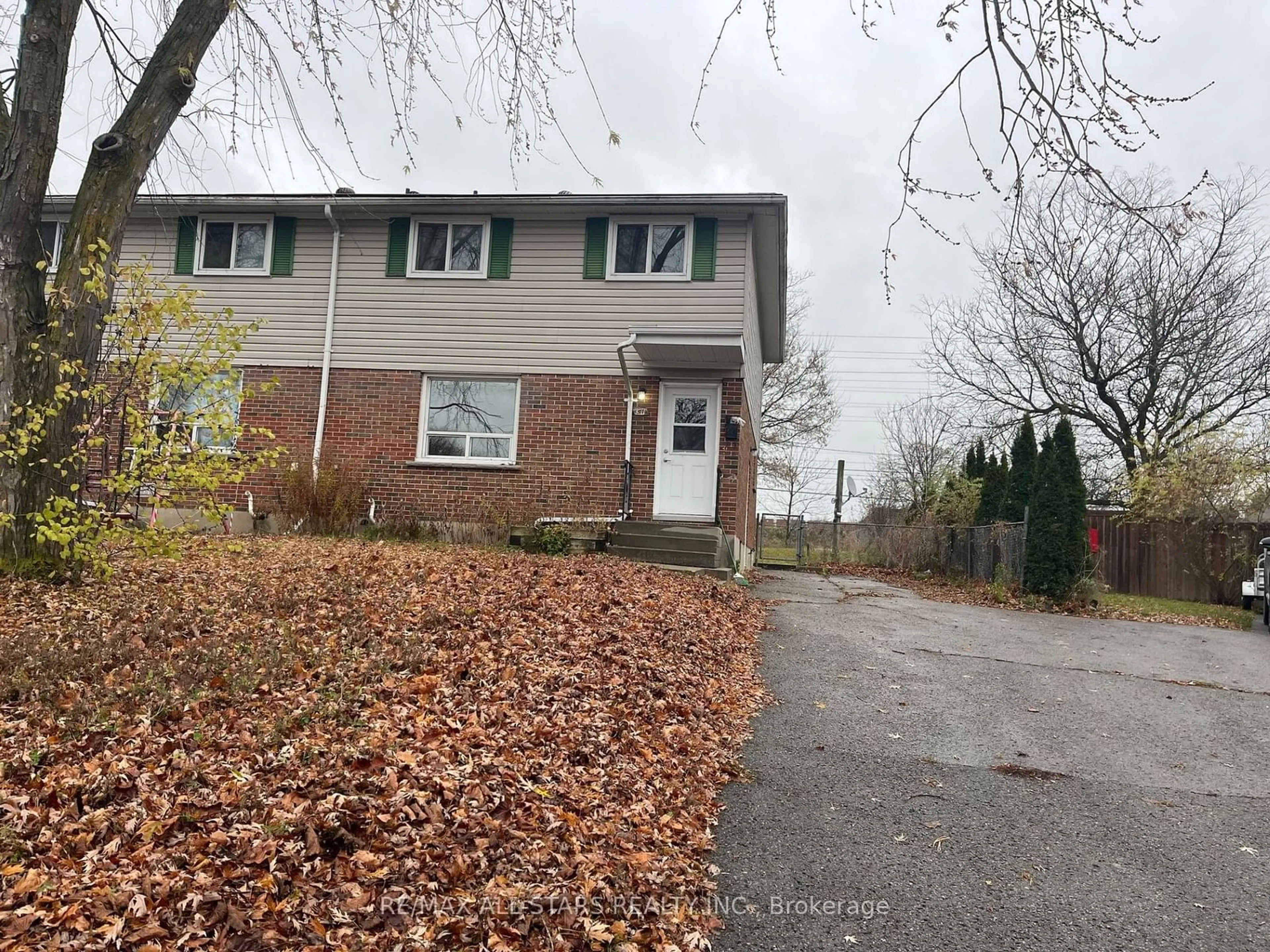 Frontside or backside of a home, the street view for 51 Maryknoll Ave, Kawartha Lakes Ontario K9V 1A7