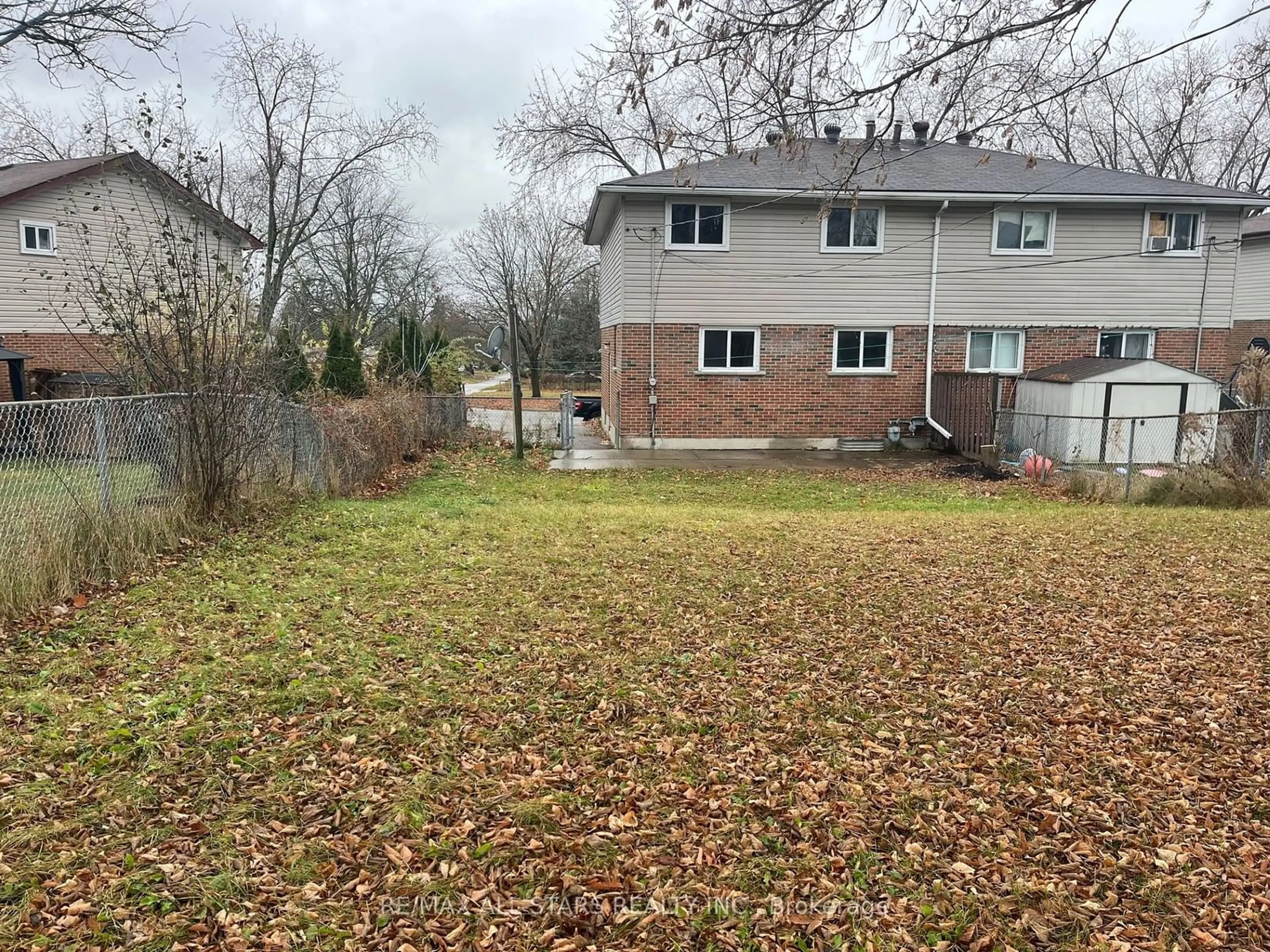 Frontside or backside of a home, the fenced backyard for 51 Maryknoll Ave, Kawartha Lakes Ontario K9V 1A7