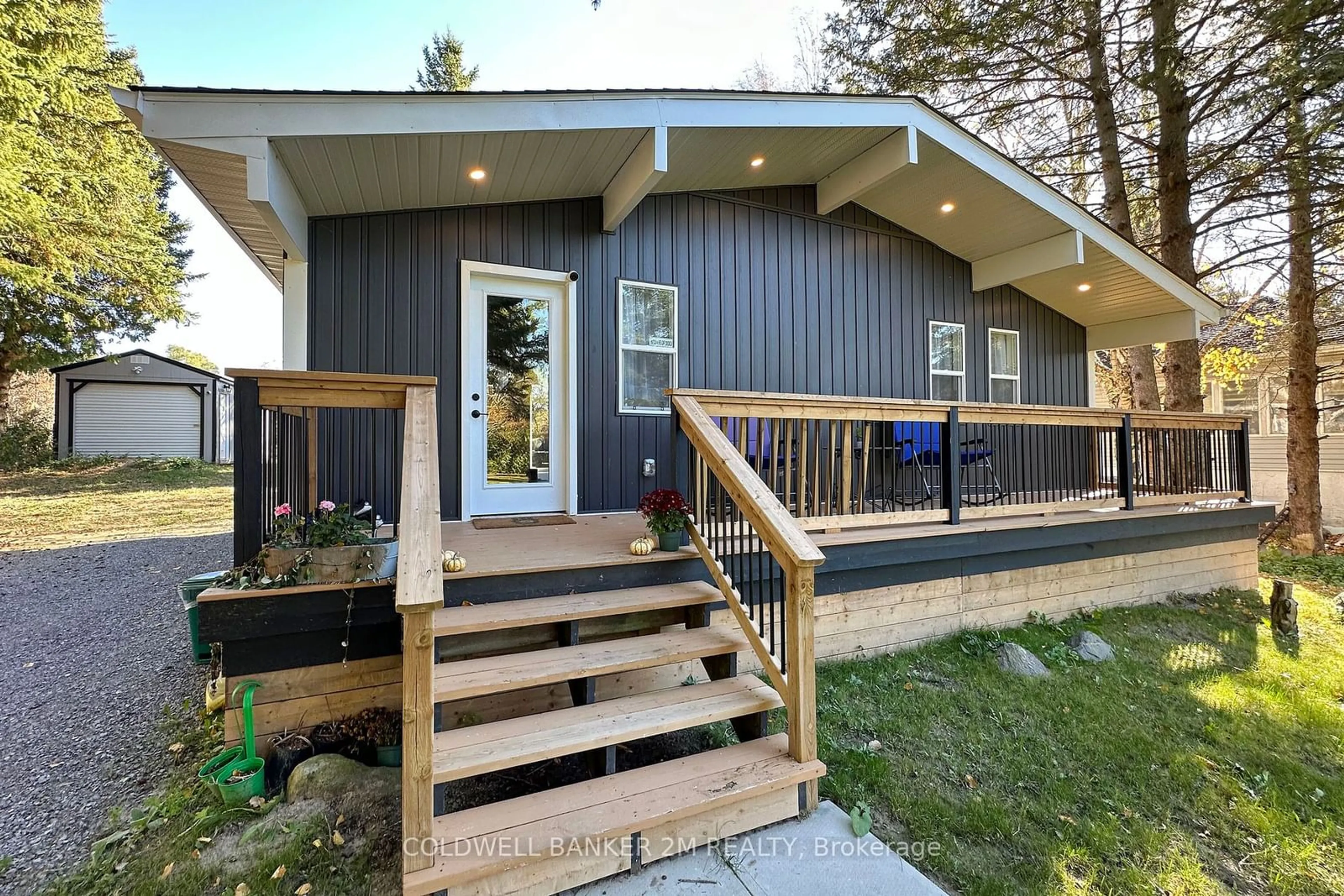 Frontside or backside of a home, cottage for 122 McGill Dr, Kawartha Lakes Ontario L0B 1K0