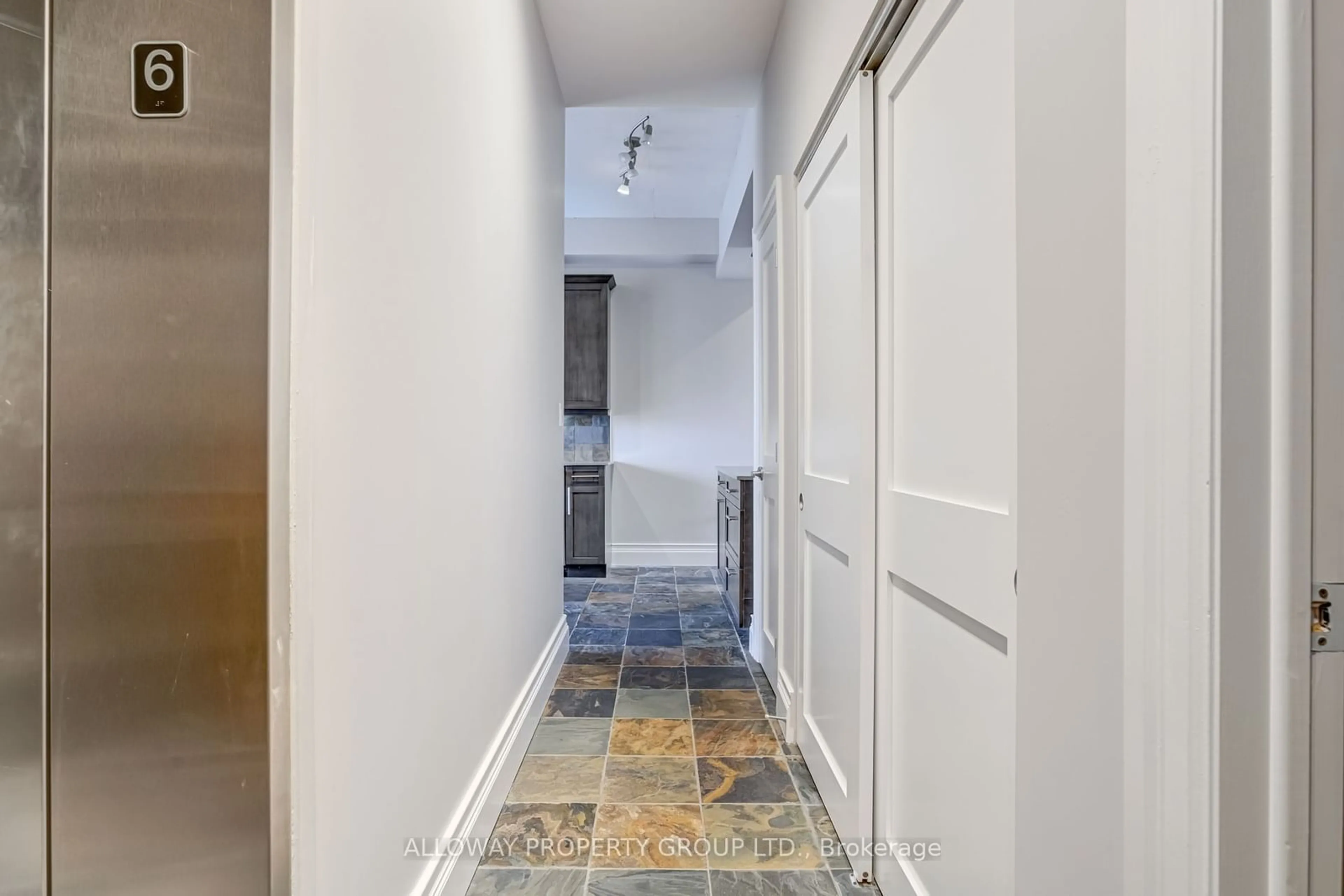 Indoor entryway, cement floor for 42 Bridgeport Rd #507, Waterloo Ontario N2J 0B3