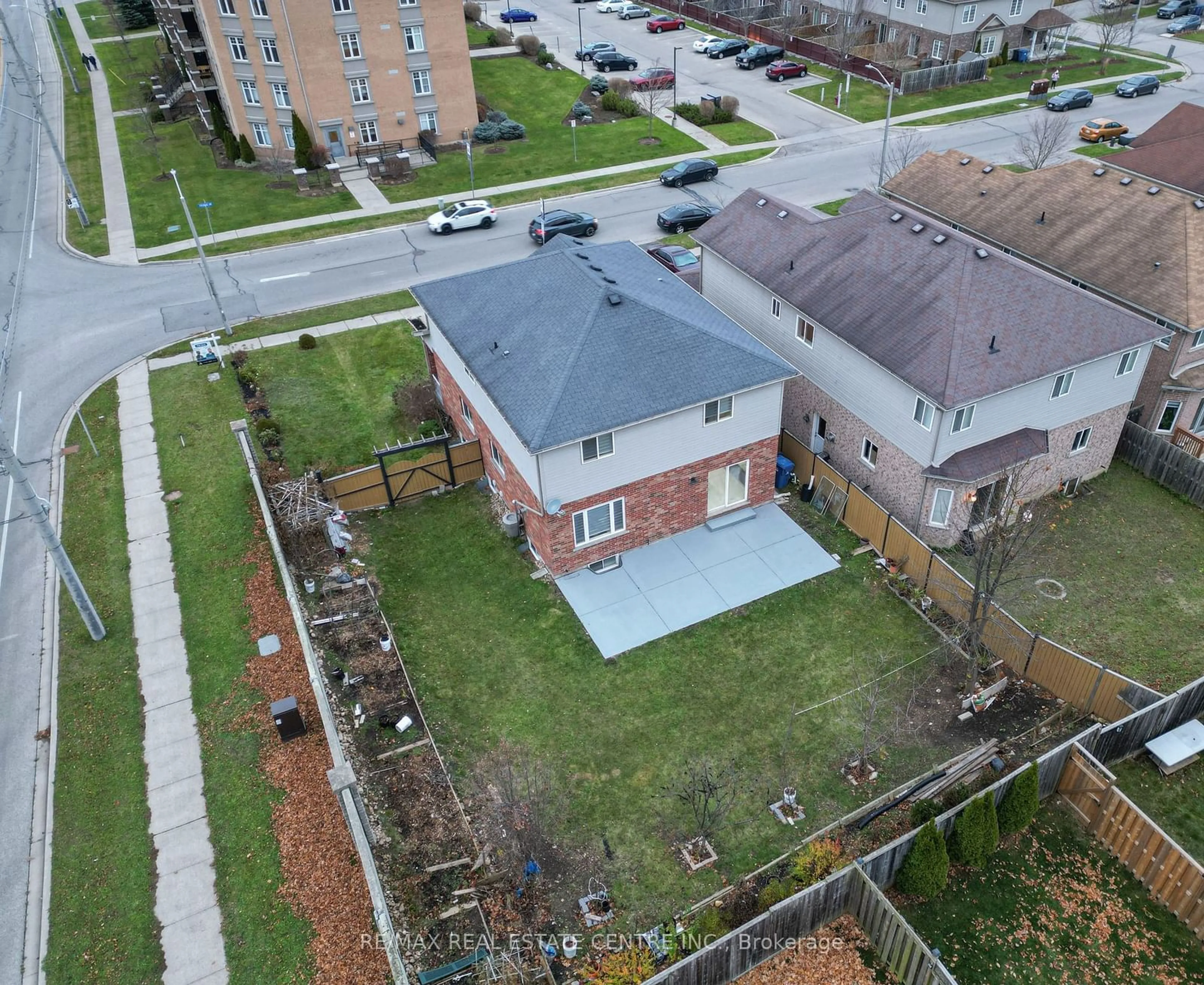 Frontside or backside of a home, the fenced backyard for 1 Colonial Dr, Guelph Ontario N1L 1T7