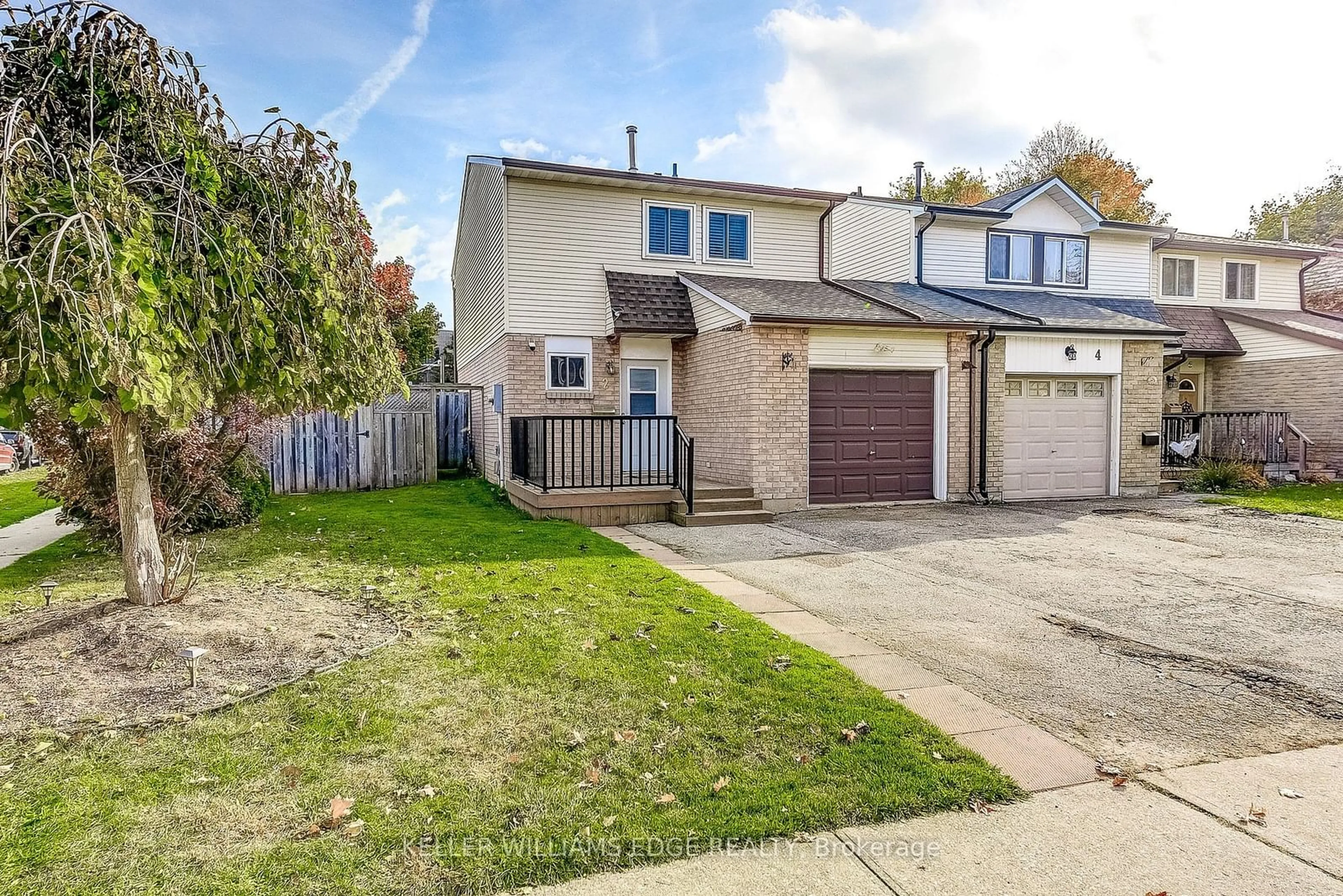 A pic from exterior of the house or condo, the fenced backyard for 2 Parkside Dr, Brant Ontario N3L 3S7