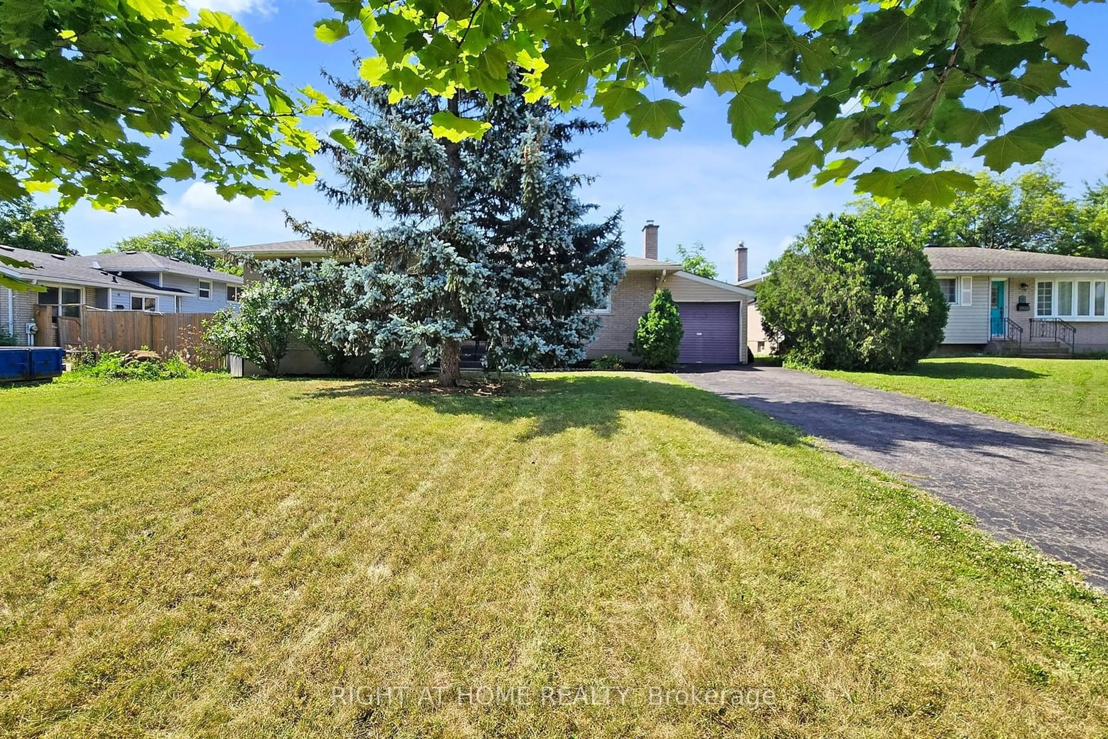 A pic from exterior of the house or condo, the fenced backyard for 4 Chapman Crt, St. Catharines Ontario L2M 6H9