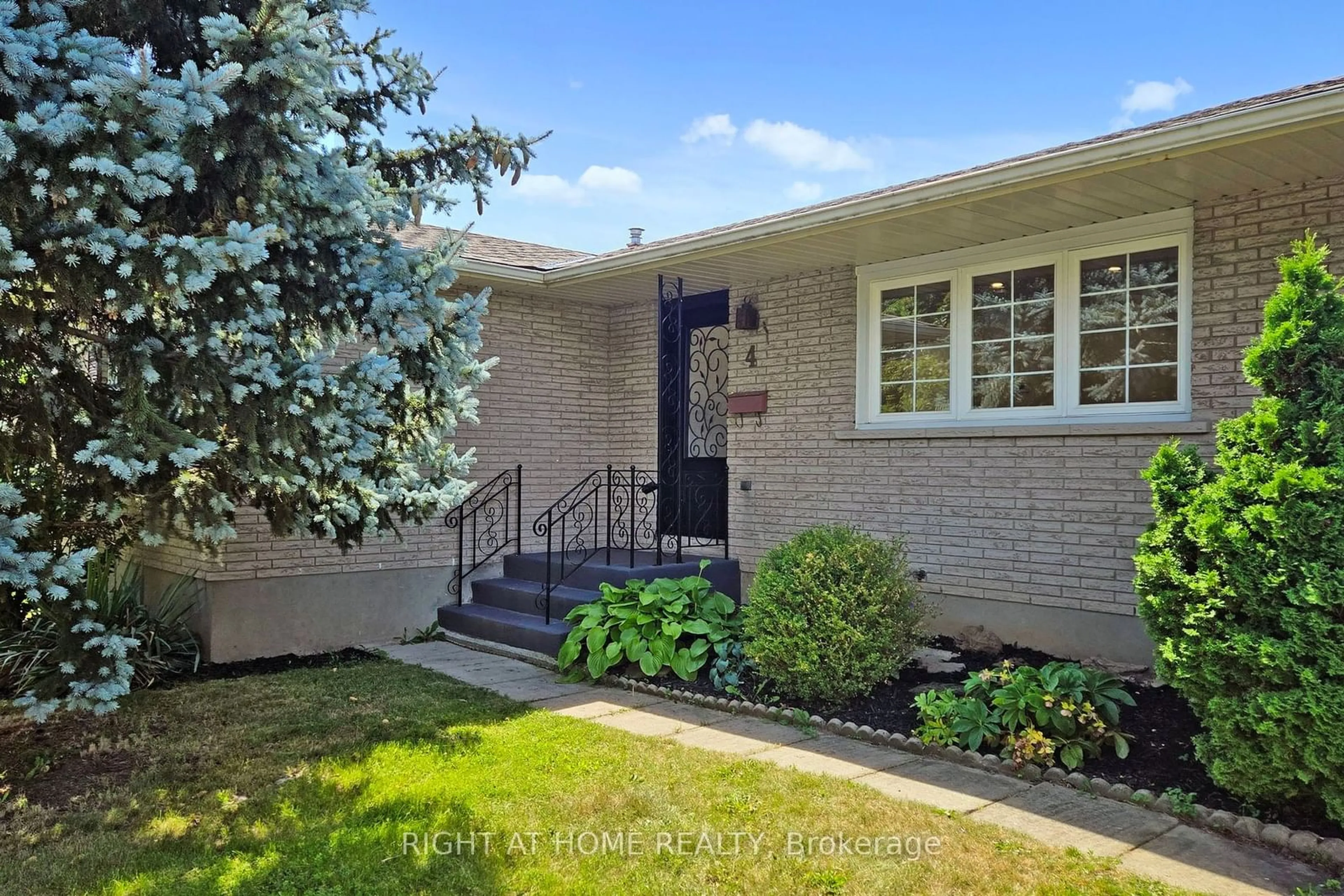 A pic from exterior of the house or condo, the fenced backyard for 4 Chapman Crt, St. Catharines Ontario L2M 6H9