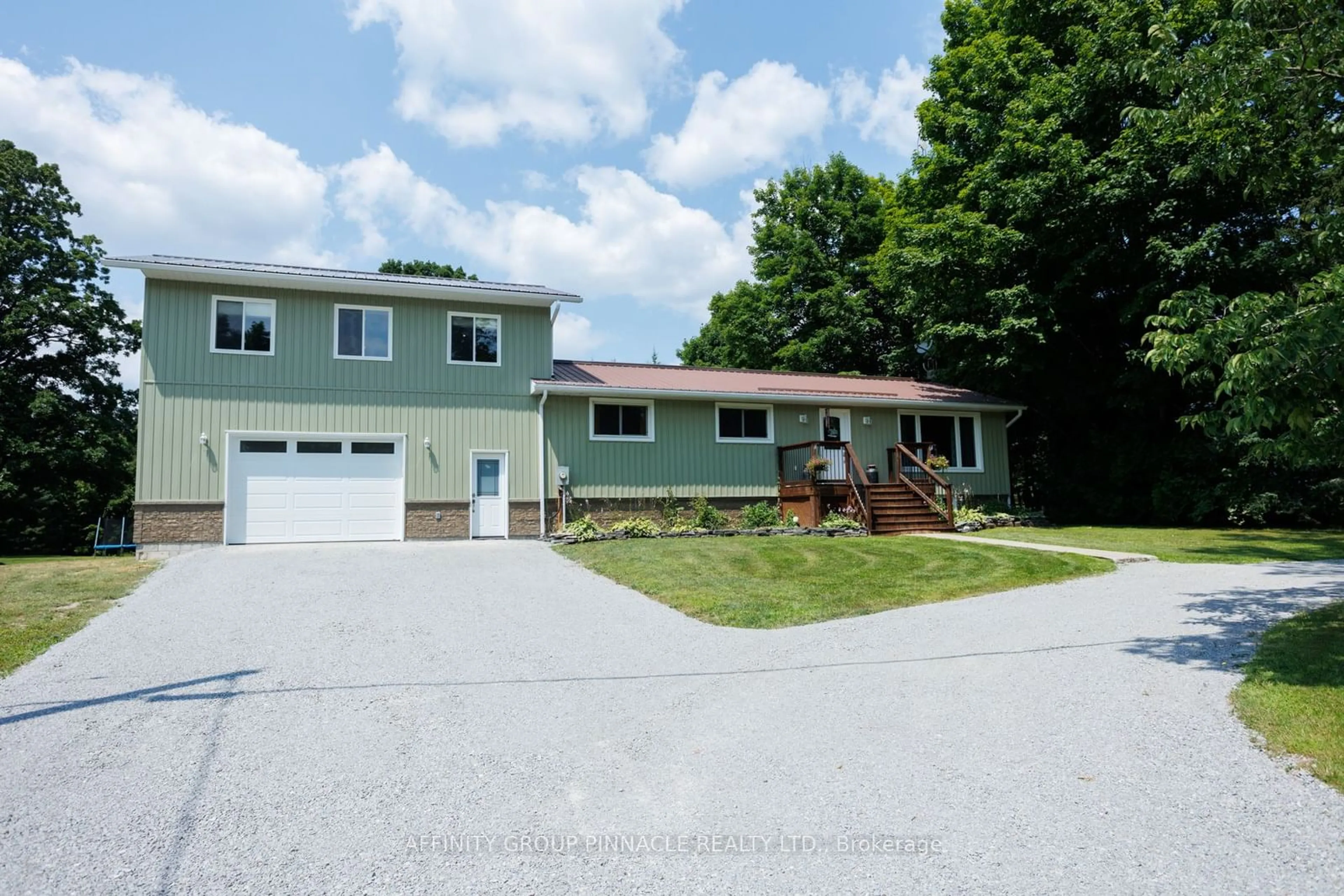 Frontside or backside of a home, the street view for 671 Balsam Lake Dr, Kawartha Lakes Ontario K0M 2B0