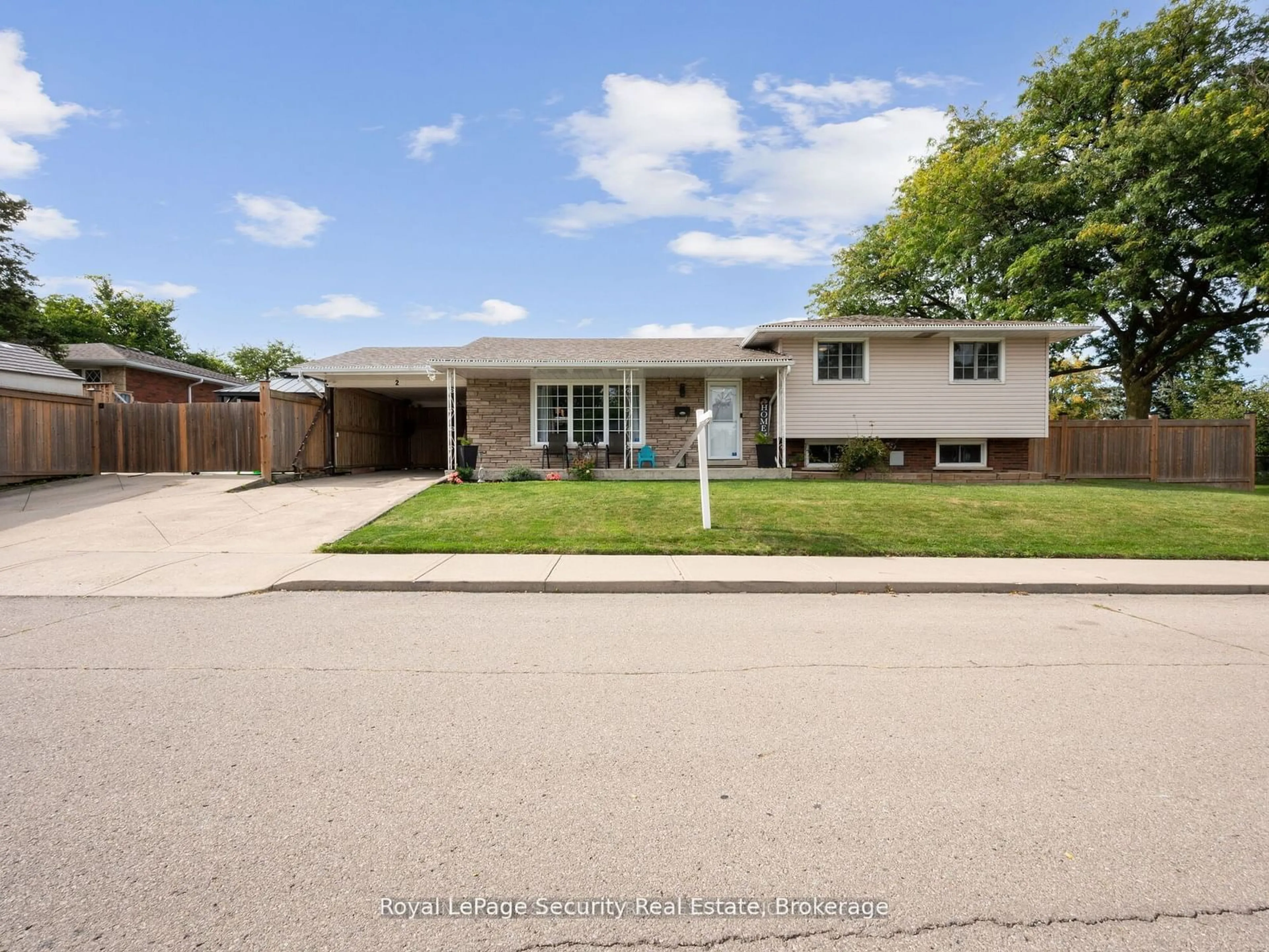 Frontside or backside of a home, the street view for 2 Maitland Ave, Hamilton Ontario L9A 3J3